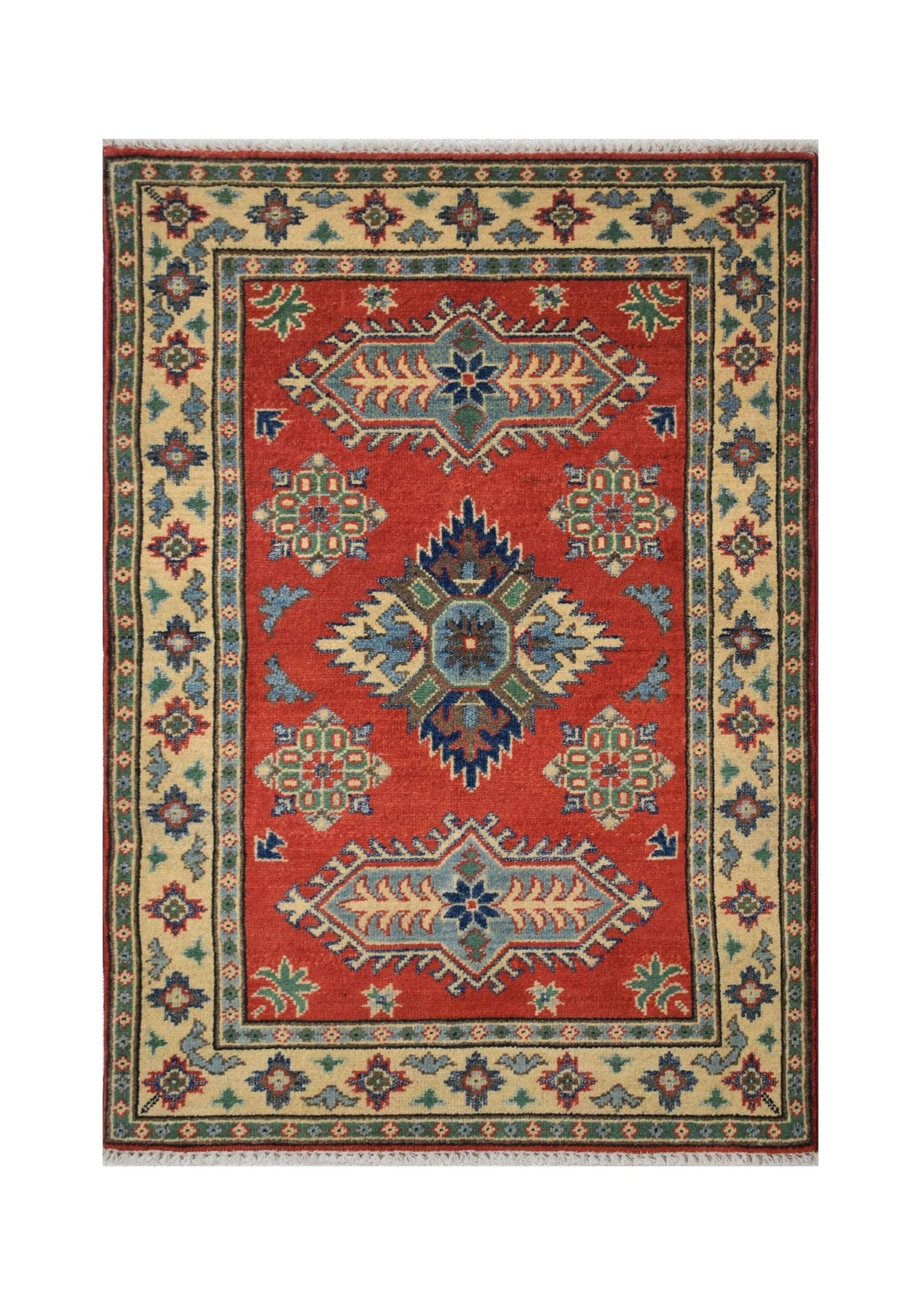 Handmade Afghan Kazakh rug featuring a geometric medallion pattern in red, blue, and cream tones.