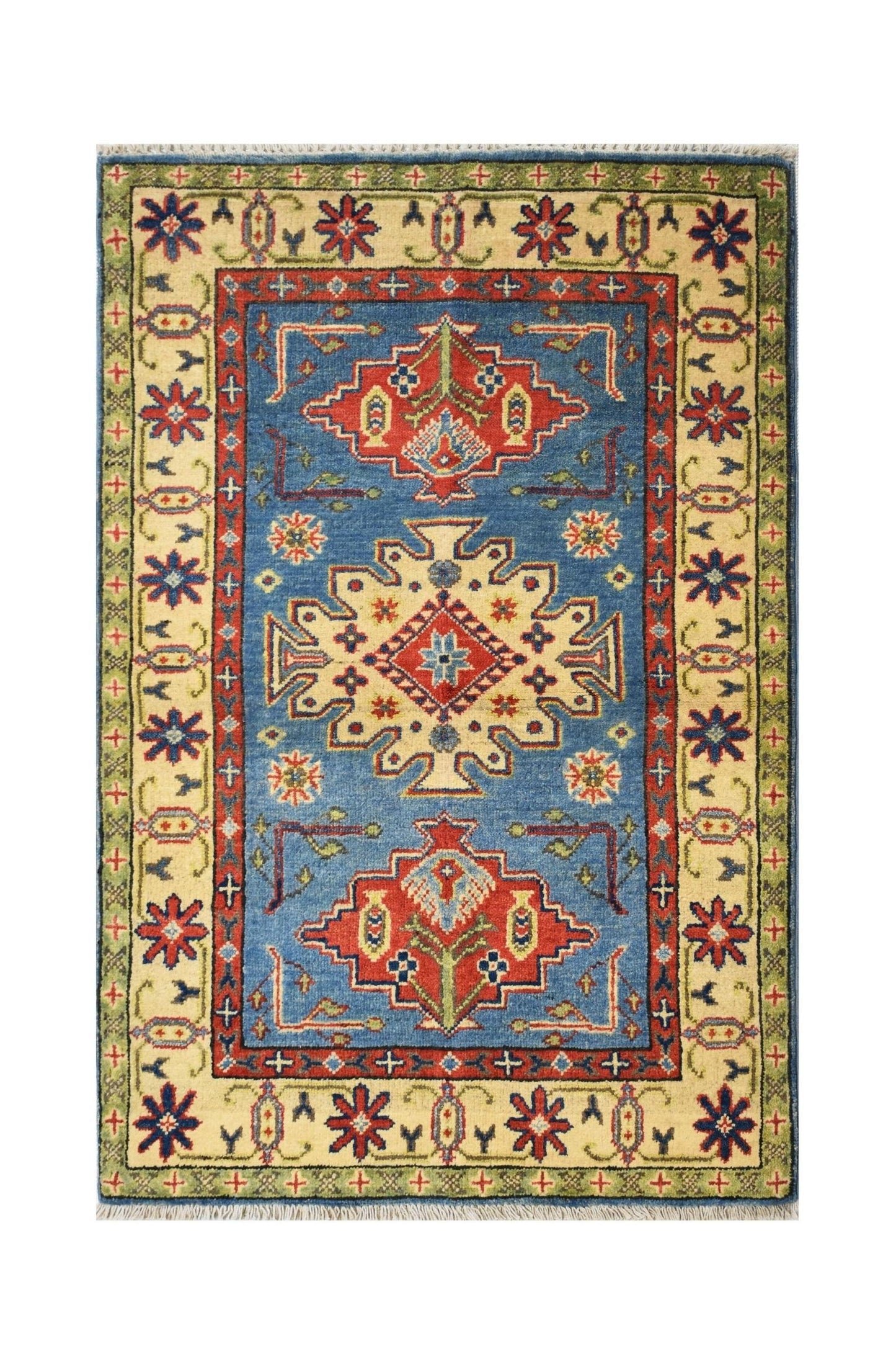 Handmade Afghan Kazakh rug featuring a blue central field with geometric motifs and floral borders.