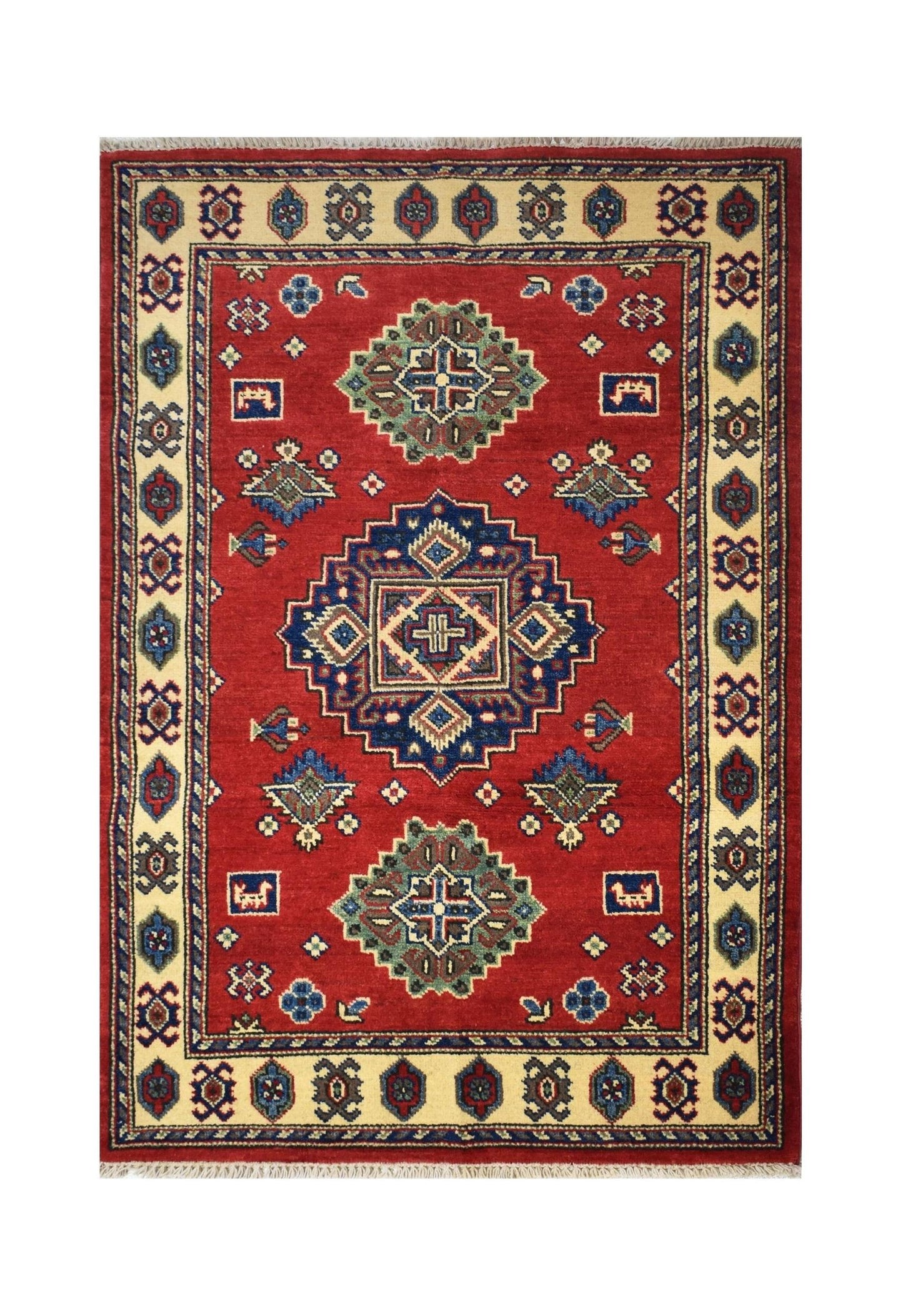 Handmade Afghan Kazakh rug featuring a geometric medallion pattern in red, blue, and cream wool.