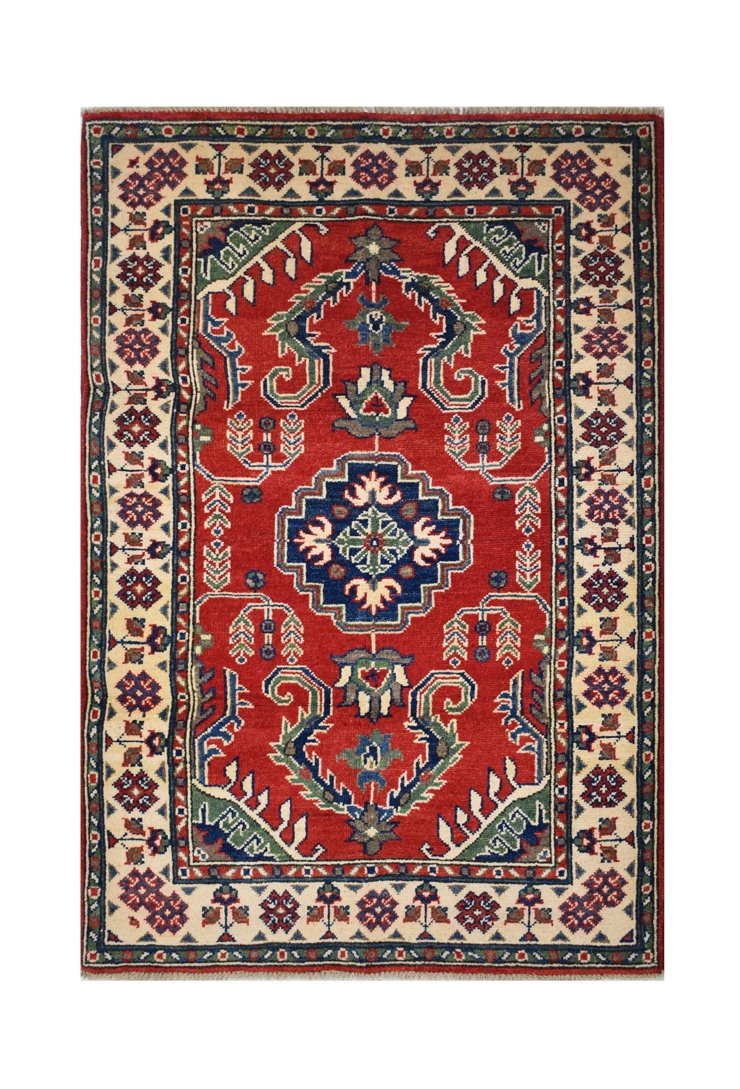 Handmade Afghan Kazakh rug featuring a central blue medallion on a red field with floral motifs.