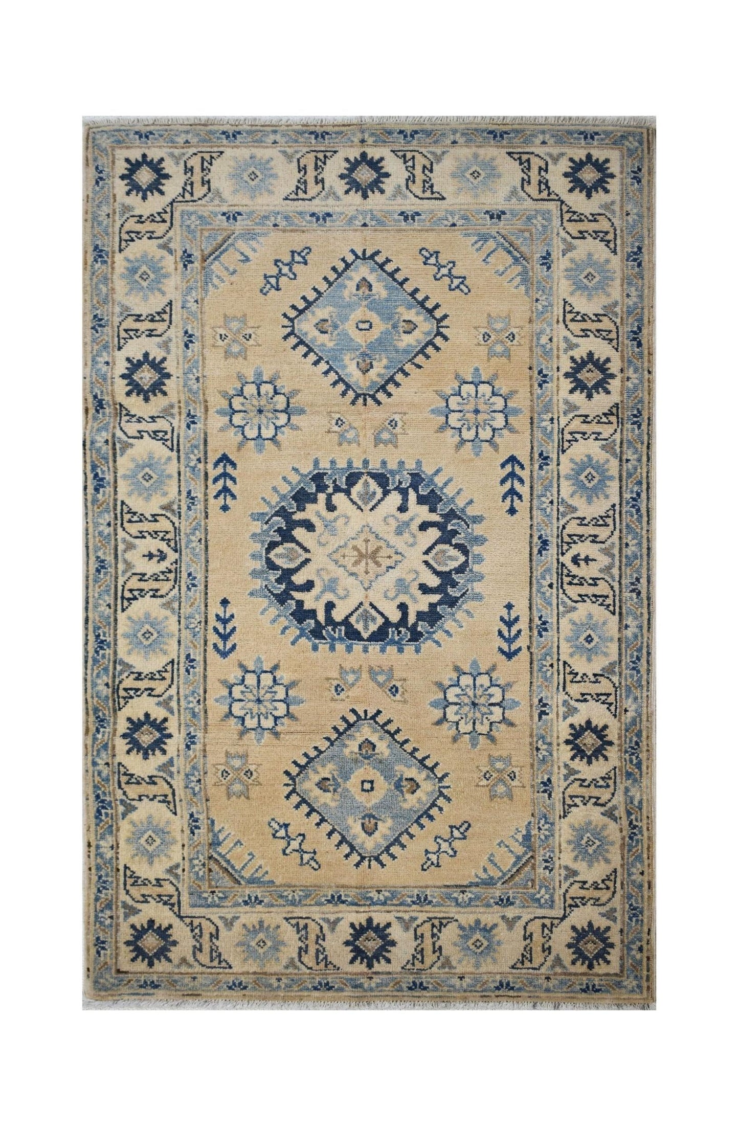 Handmade Afghan Kazakh rug featuring a traditional geometric pattern in blue and beige tones.