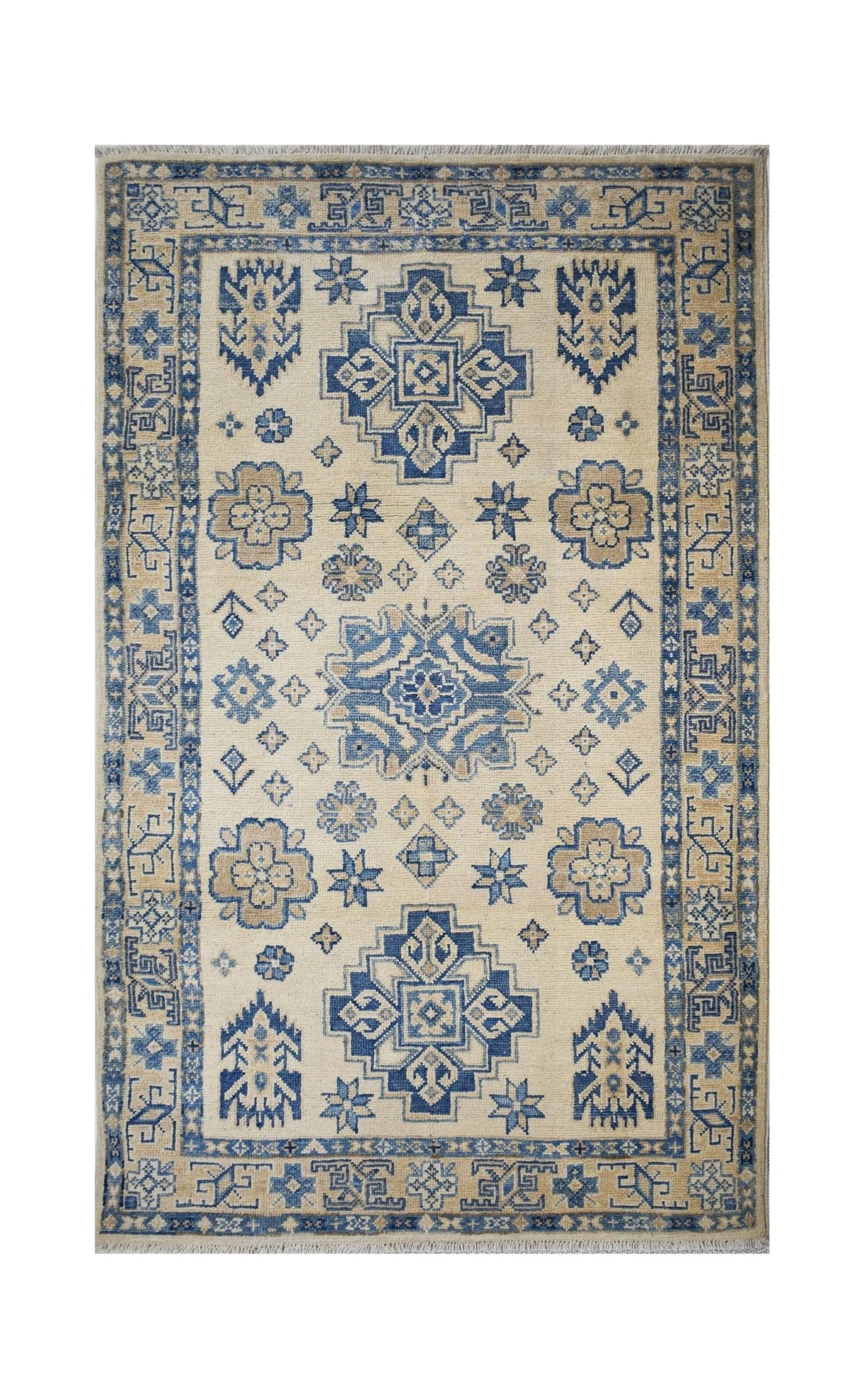 Handmade Afghan Kazakh wool rug featuring a traditional blue and beige geometric pattern.
