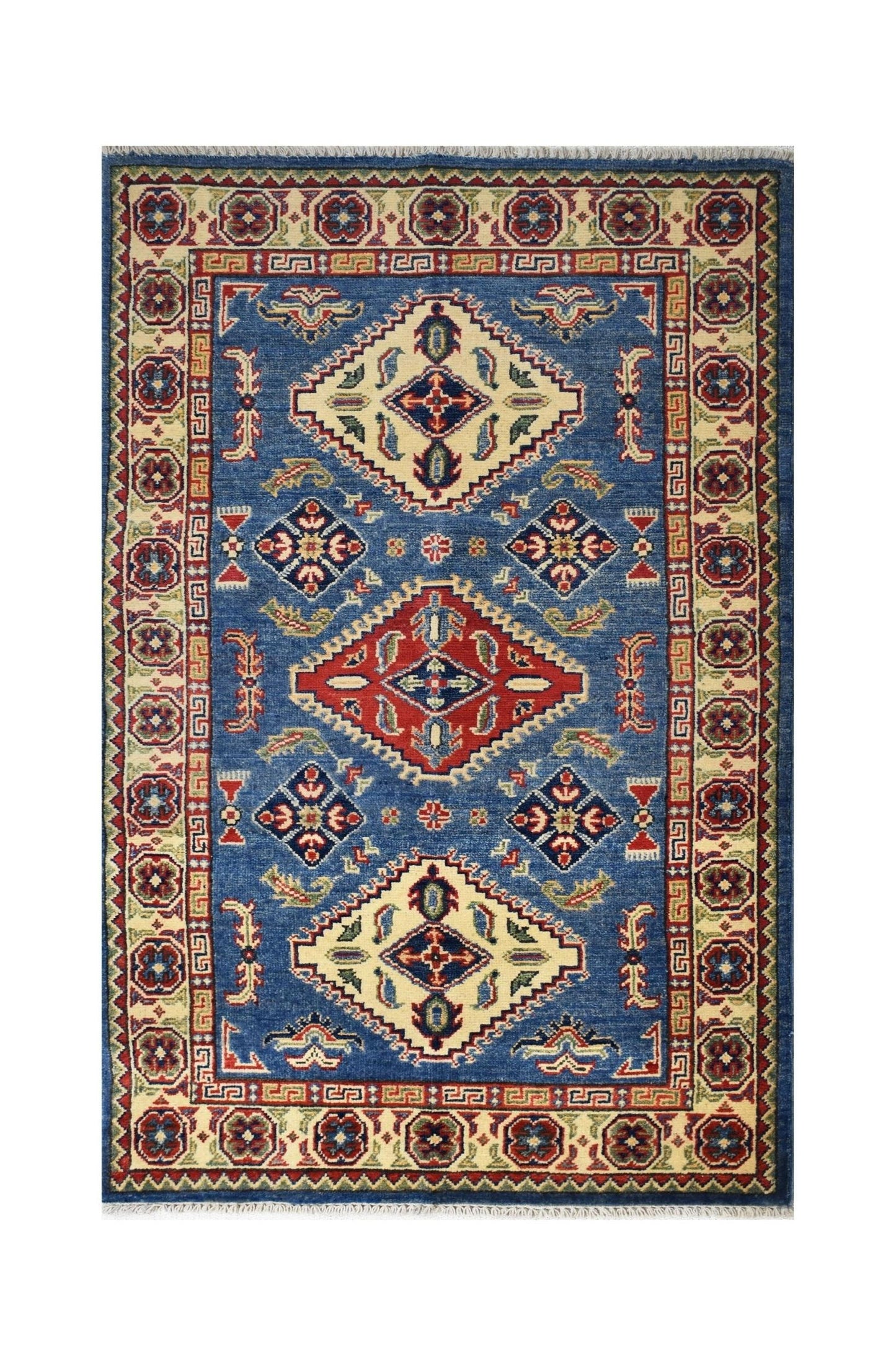 Handmade Afghan Kazakh rug featuring a blue field with geometric diamond motifs and a patterned border.