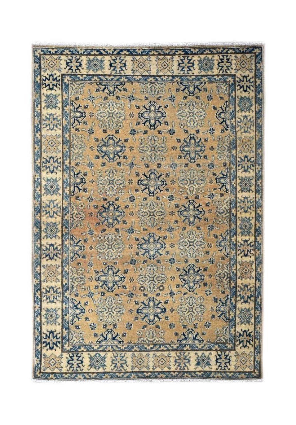 Handmade Afghan Kazakh rug featuring a beige field with blue geometric floral motifs.