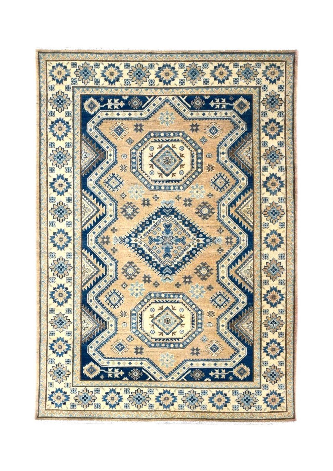 Handmade Afghan Kazakh rug featuring a geometric pattern in shades of beige and blue.