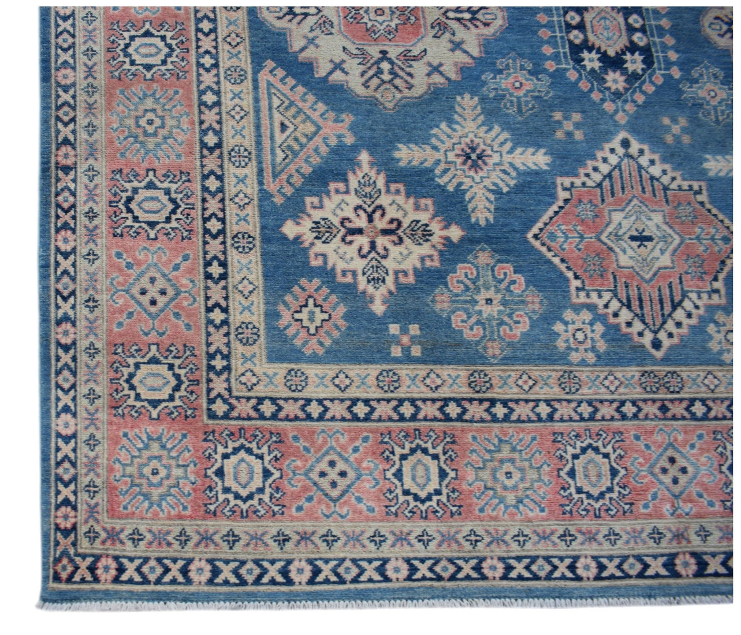 Handmade Afghan Kazakh rug featuring traditional geometric motifs in blue, pink, and cream.
