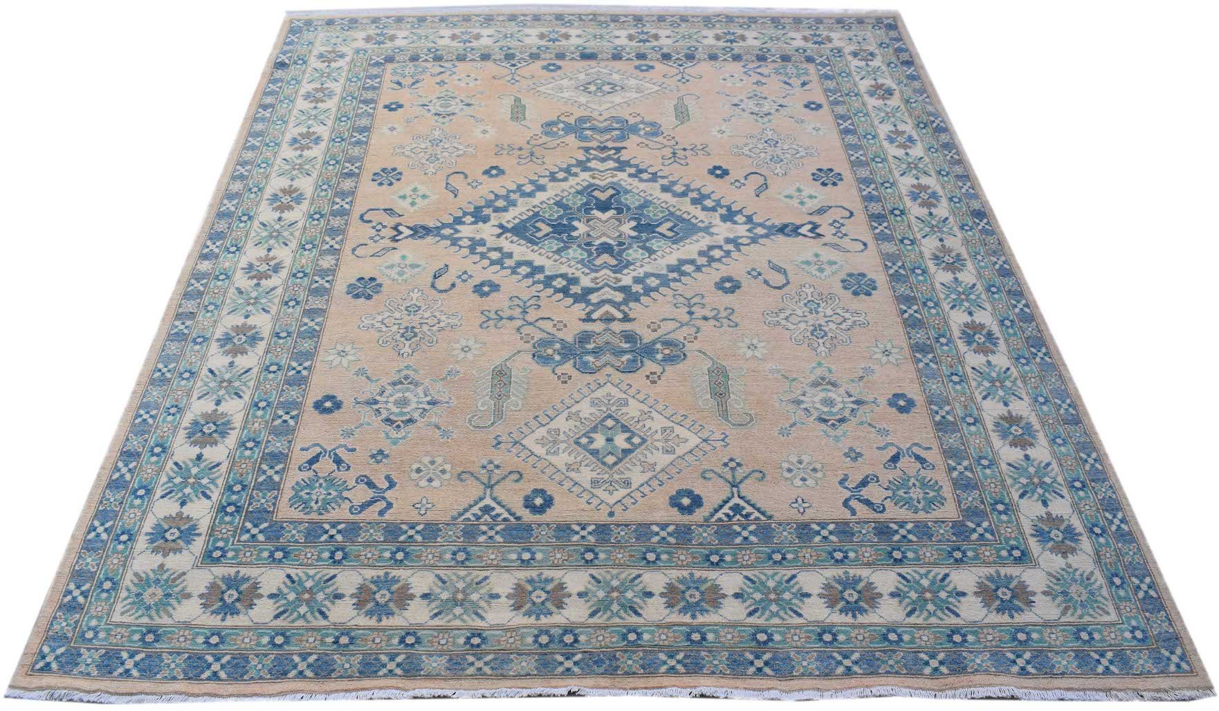 Handmade Afghan Kazakh rug featuring a beige field with blue and grey geometric patterns.