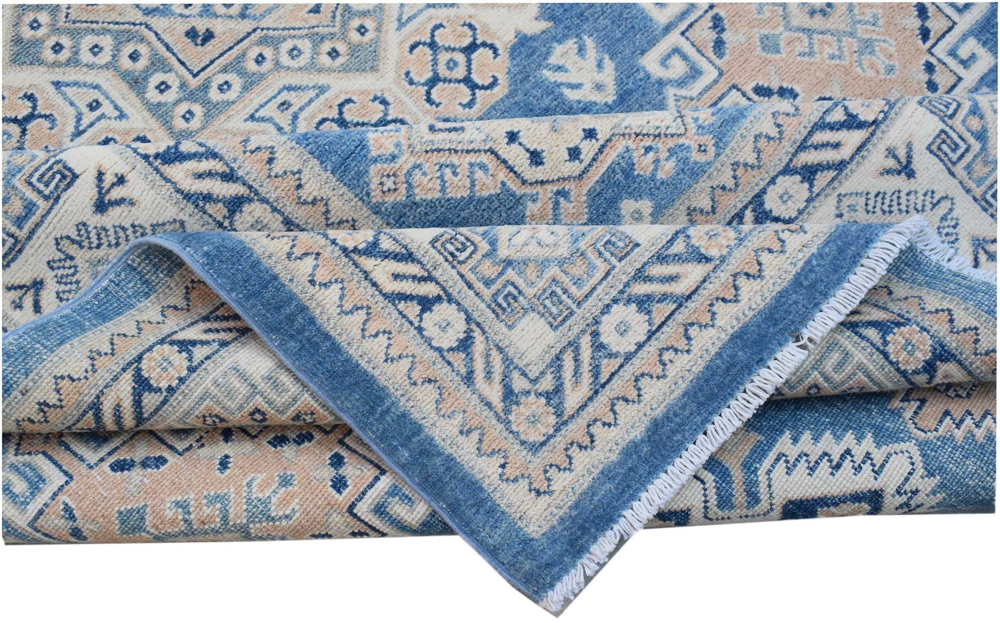 A handmade Afghan Kazakh rug featuring a geometric pattern in shades of blue and beige.