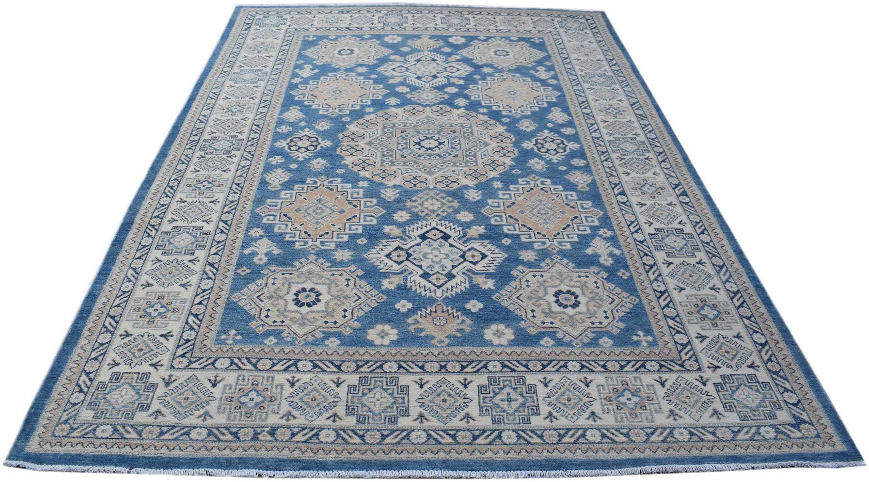 Handmade Afghan Kazakh rug featuring a geometric pattern in shades of blue, beige, and grey.
