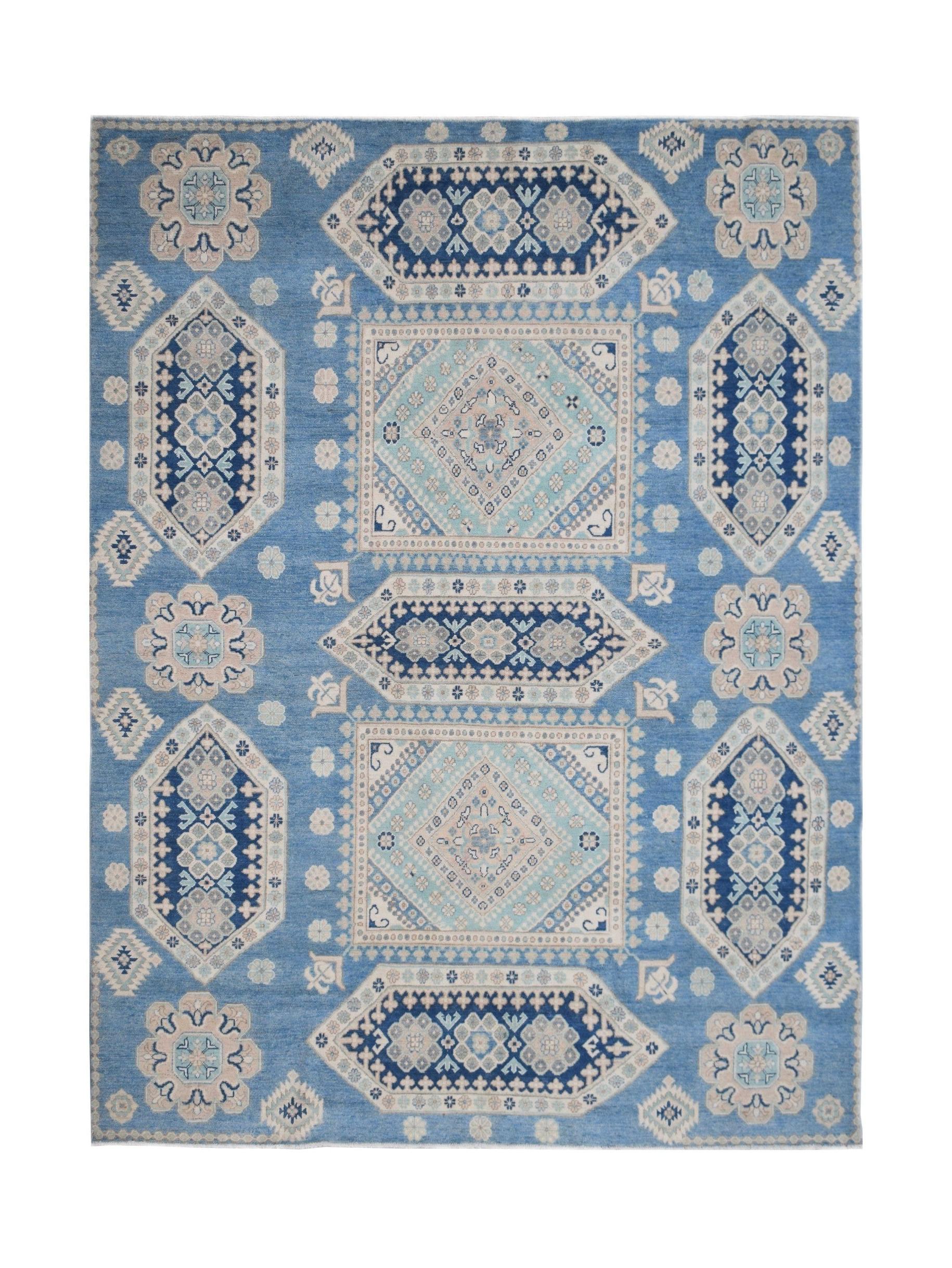 Handmade Afghan Kazakh rug featuring a geometric pattern in shades of blue, beige, and grey.