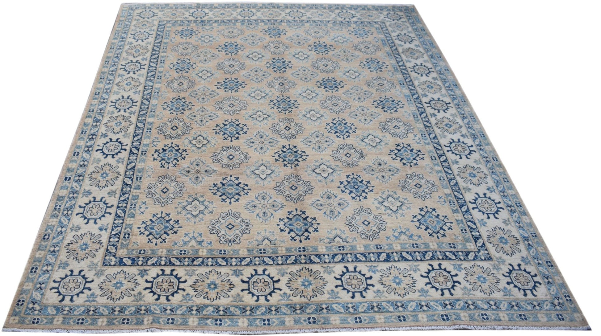 Handmade Afghan Kazakh rug featuring a traditional blue and beige geometric pattern.