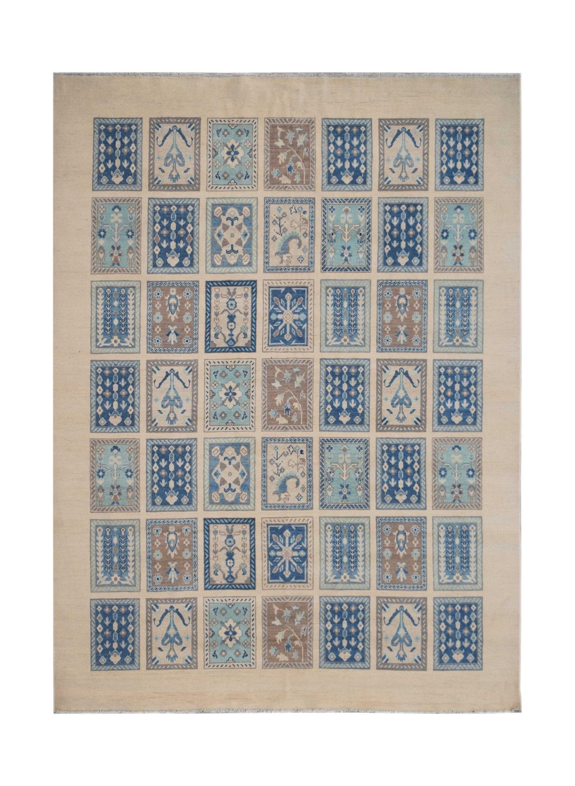 Handmade Afghan Kazakh rug featuring a grid of rectangular panels in blue, brown, and cream tones.