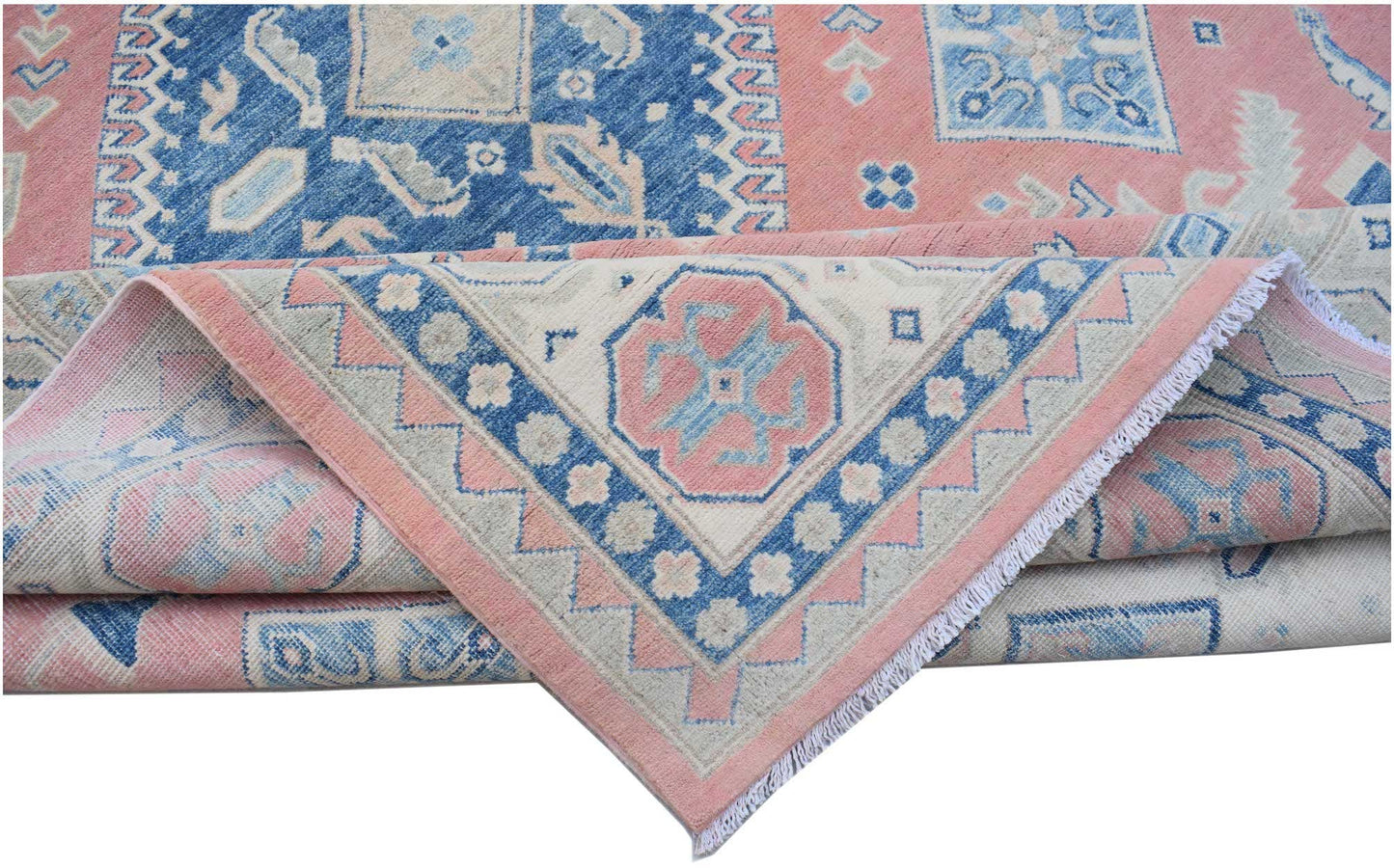 A handmade Afghan Kazakh rug featuring traditional geometric motifs in pink, blue, and cream.