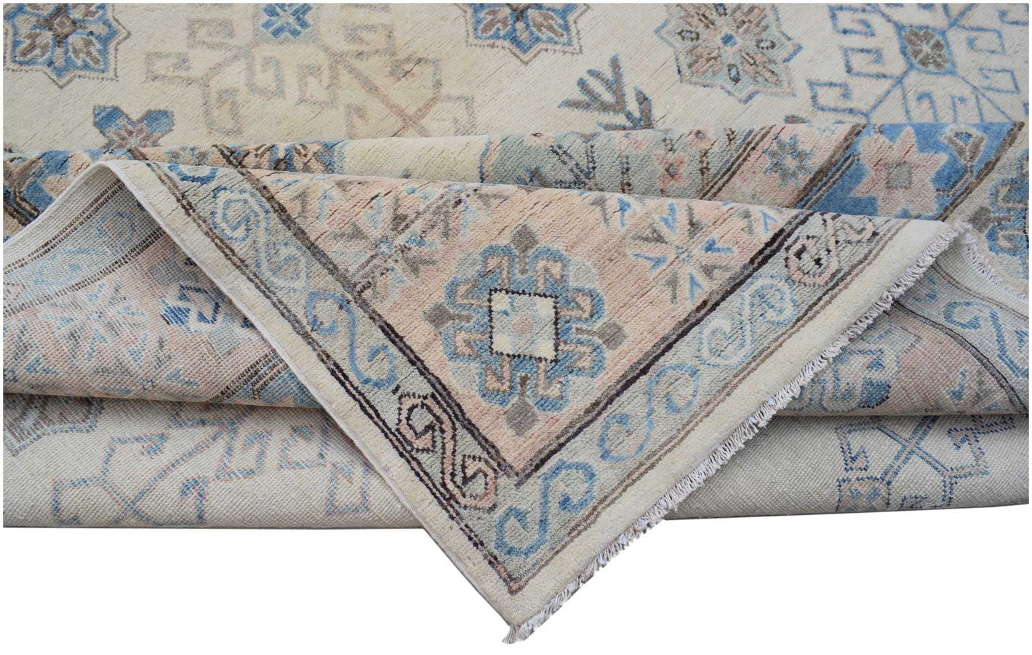 A handmade Afghan Kazakh rug featuring traditional geometric patterns in blue, pink, and cream.