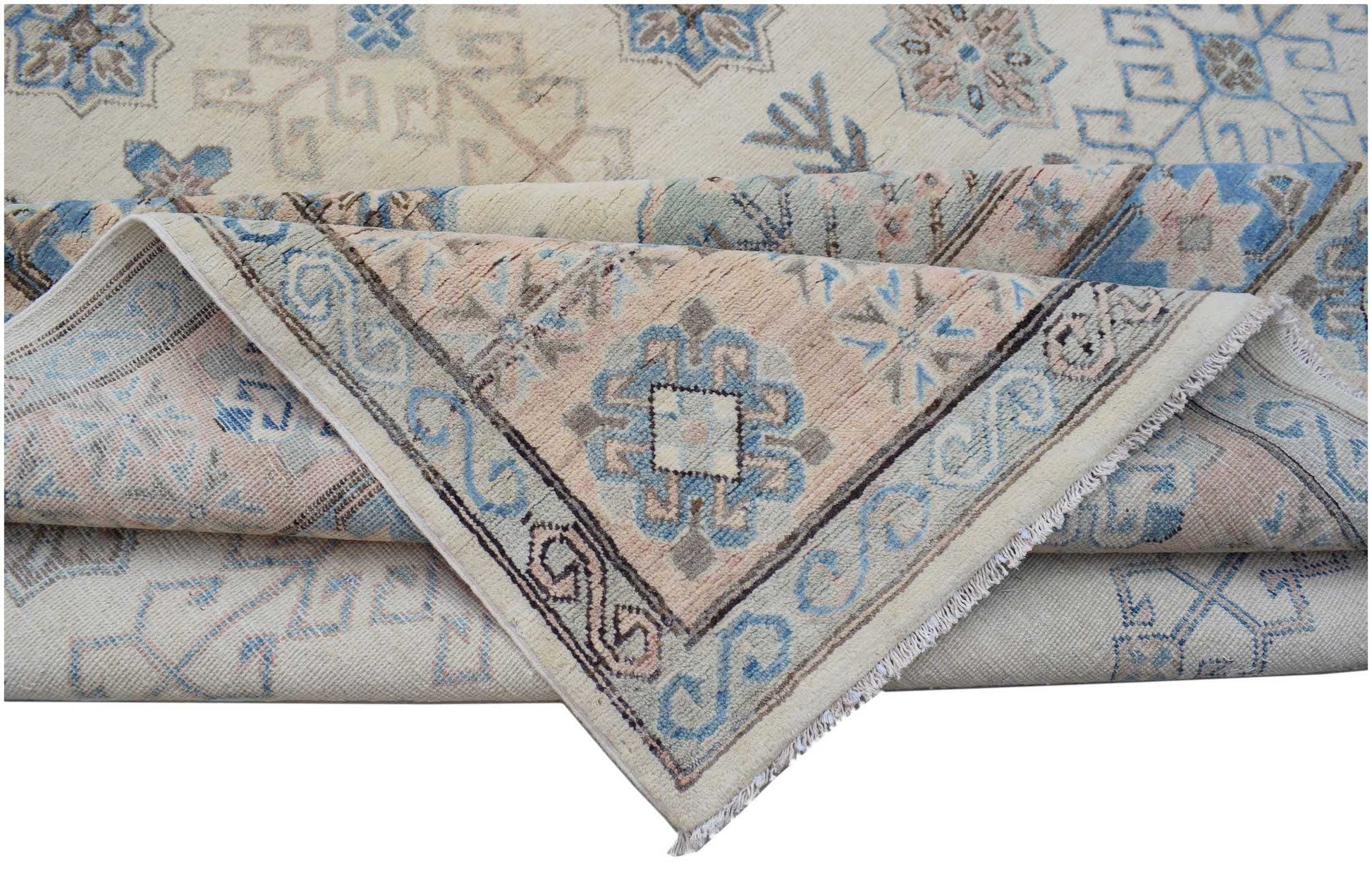 A handmade Afghan Kazakh rug featuring traditional geometric patterns in blue, pink, and cream.