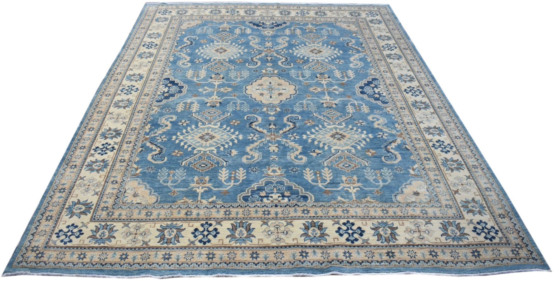 An Afghan Kazakh rug featuring a blue field with intricate beige and grey geometric patterns.