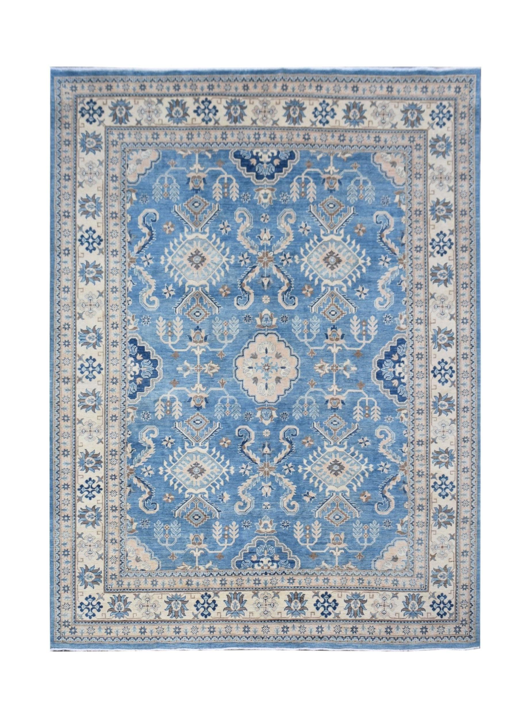 A handmade Afghan Kazakh rug featuring a blue field with intricate beige and grey geometric motifs.