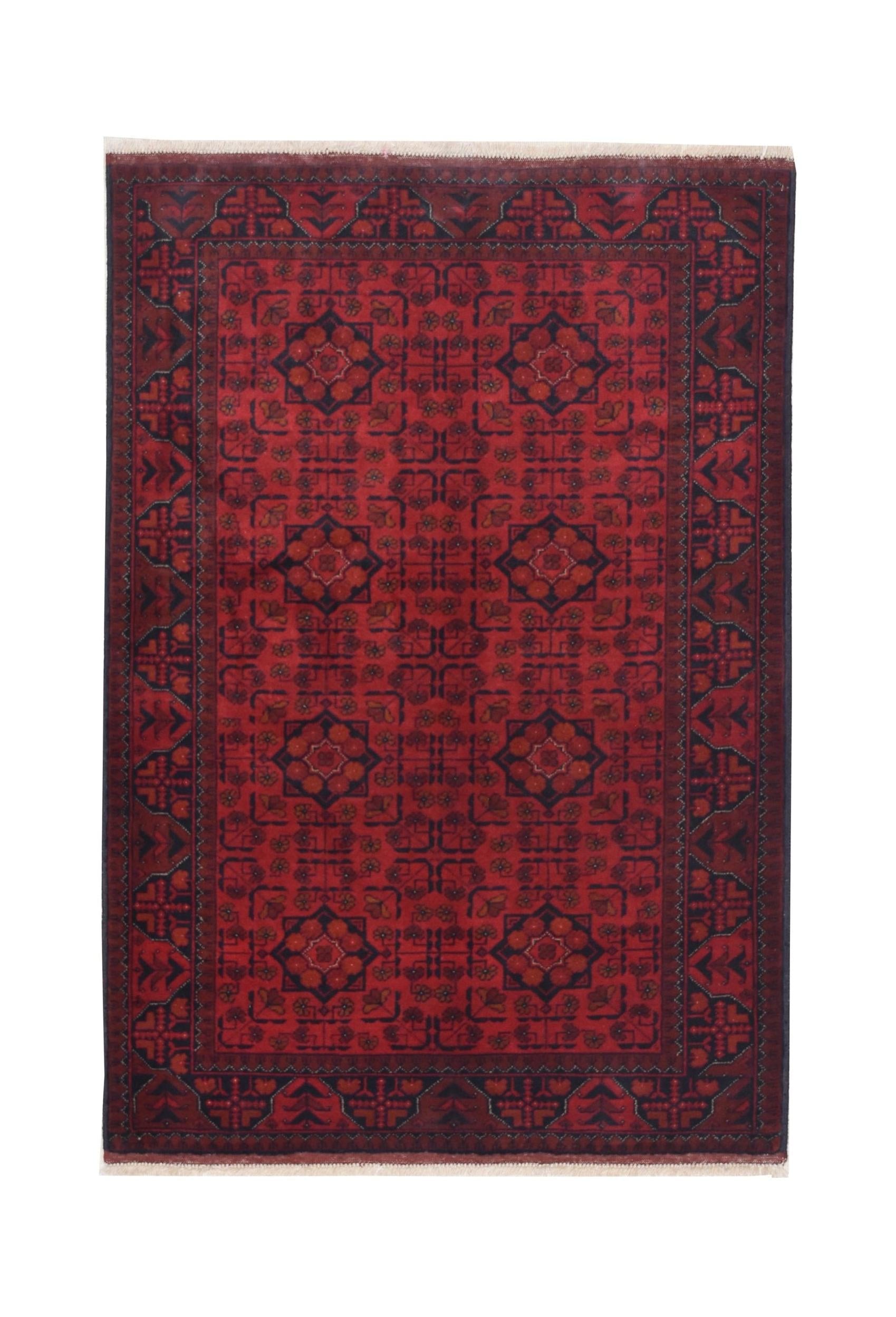 Handmade Afghan Khal Mohammadi wool rug featuring a deep red field with geometric patterns.