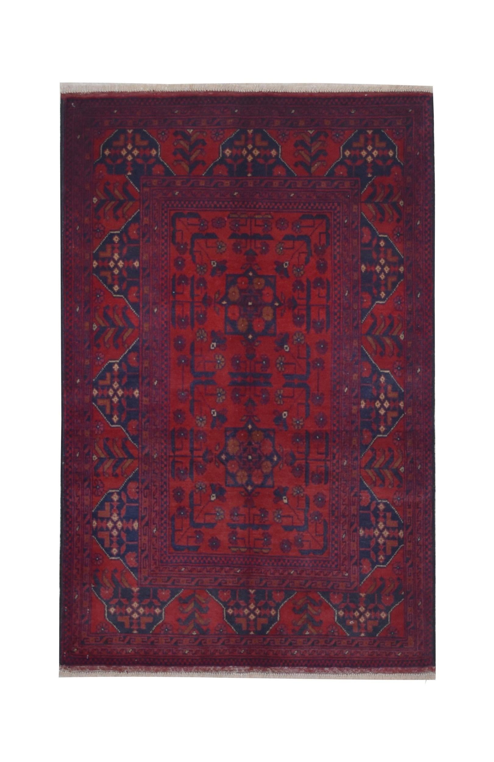 Handmade Afghan Khal Mohammadi wool rug featuring deep red tones and intricate geometric patterns.