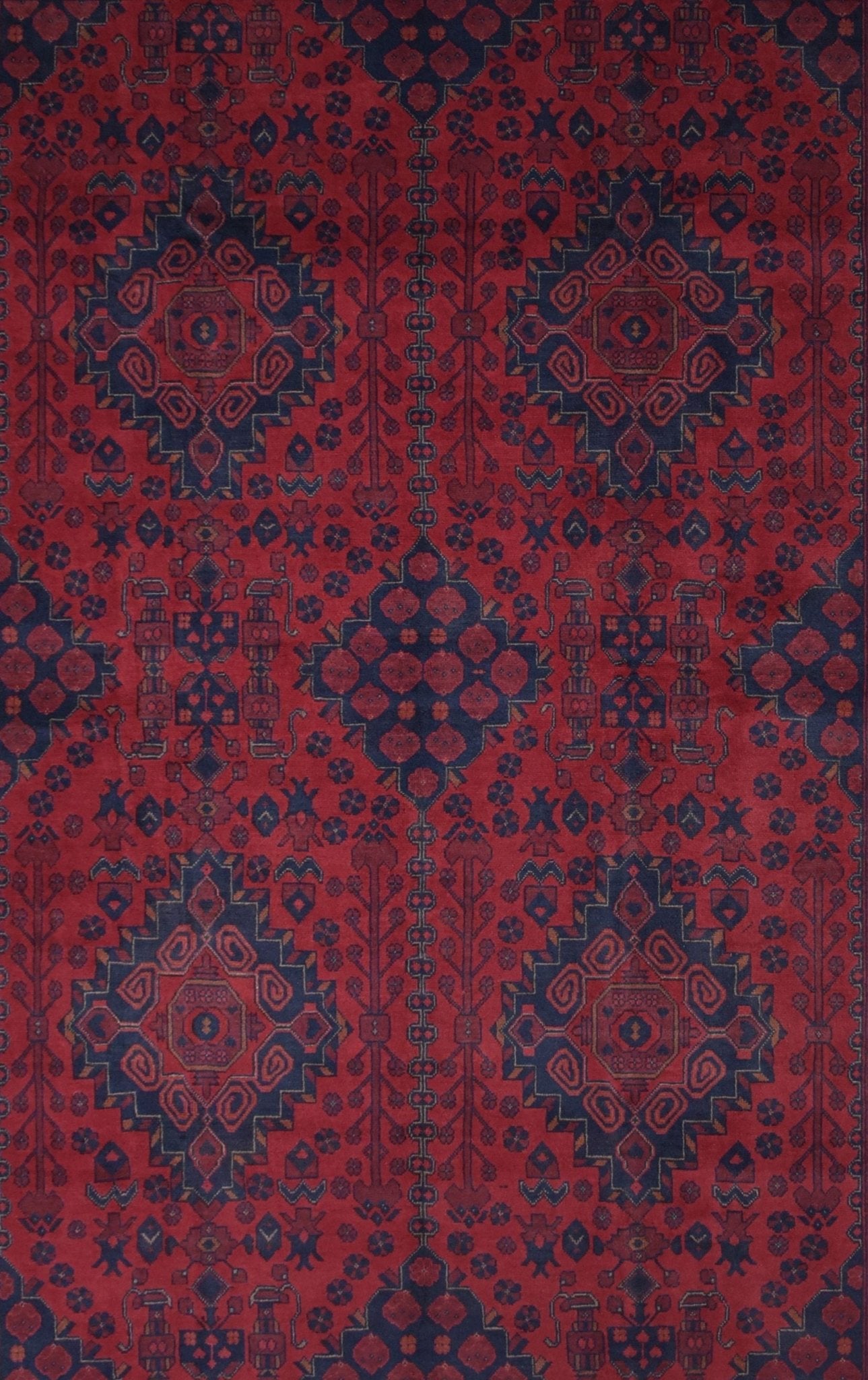 Handmade Afghan Khal Mohammadi wool rug featuring a deep red field with dark blue geometric motifs.