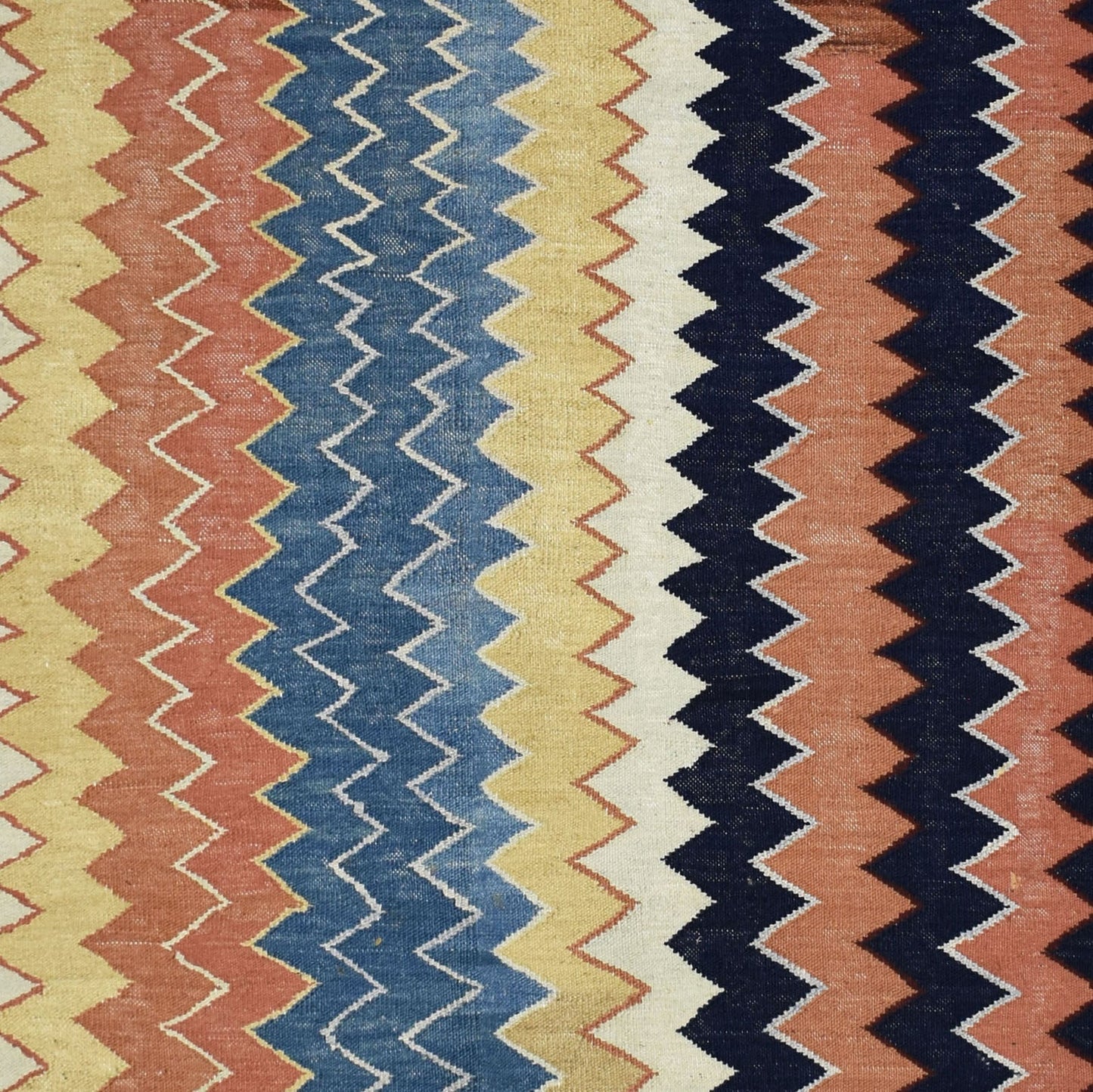 Handmade Afghan Maimana kilim rug featuring a vibrant vertical zigzag pattern in wool.