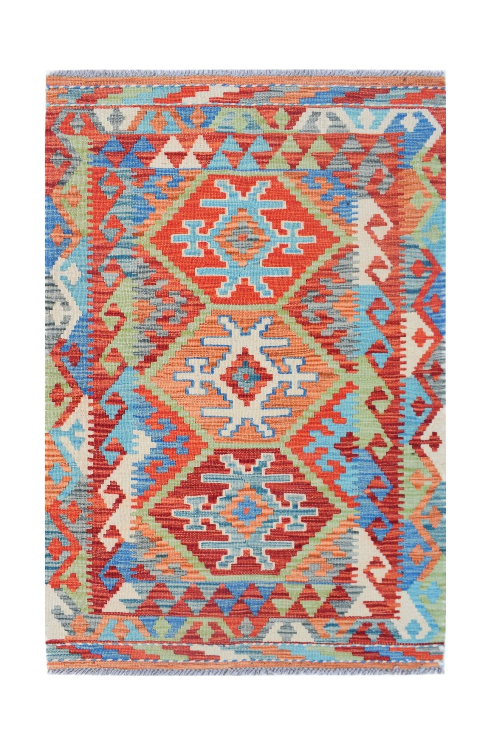 Handwoven Afghan Maimana kilim rug featuring a vibrant geometric pattern in red, blue, and green.