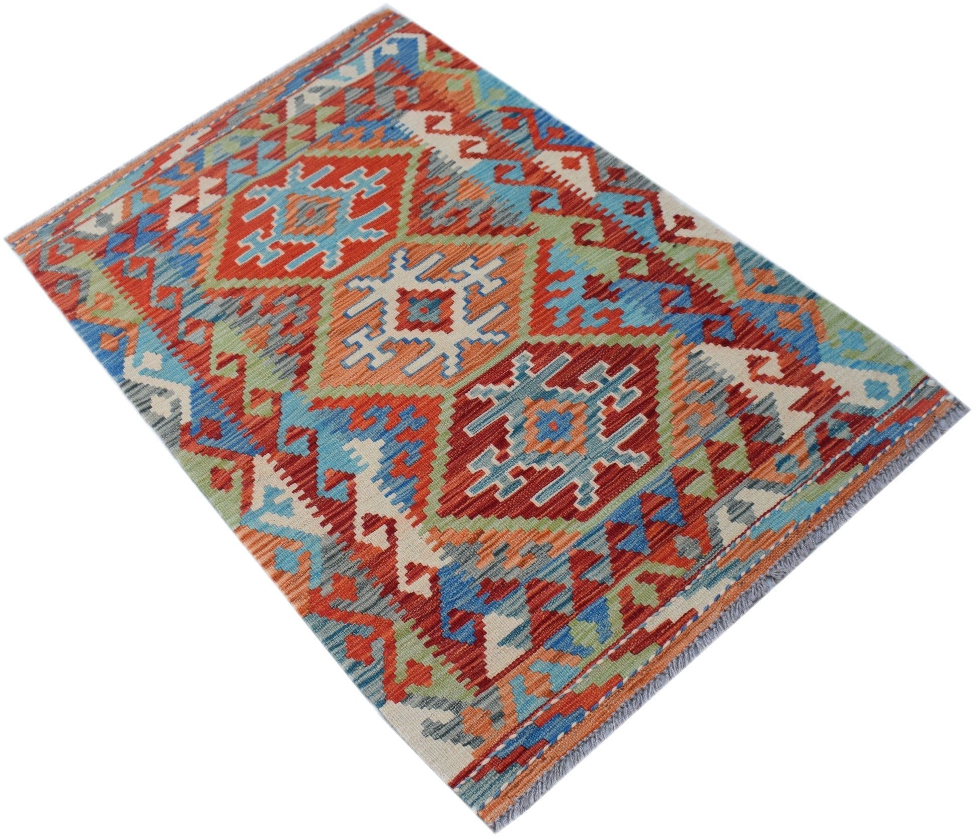 Handwoven Afghan Maimana kilim rug featuring a vibrant geometric pattern in red, blue, and green.