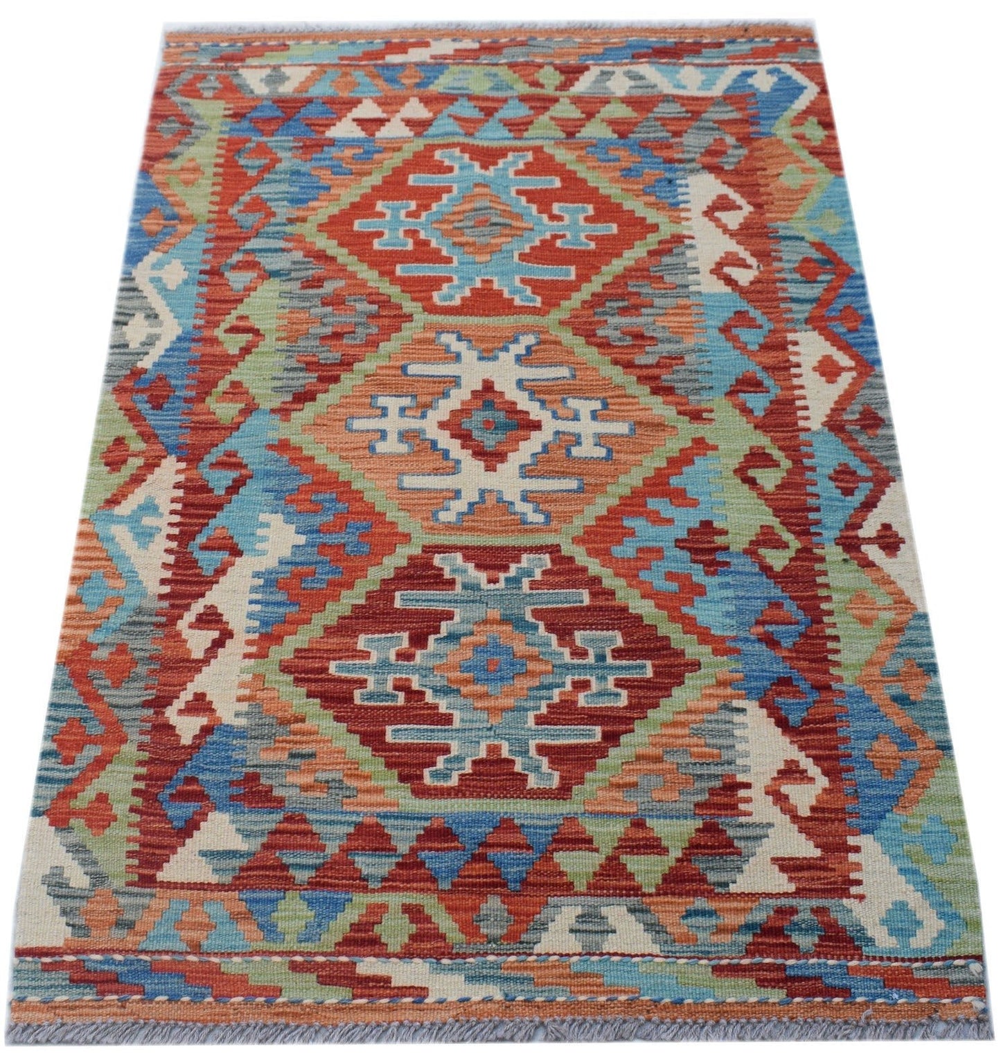 Handwoven Afghan Maimana kilim rug featuring a geometric diamond pattern in vibrant wool colors.