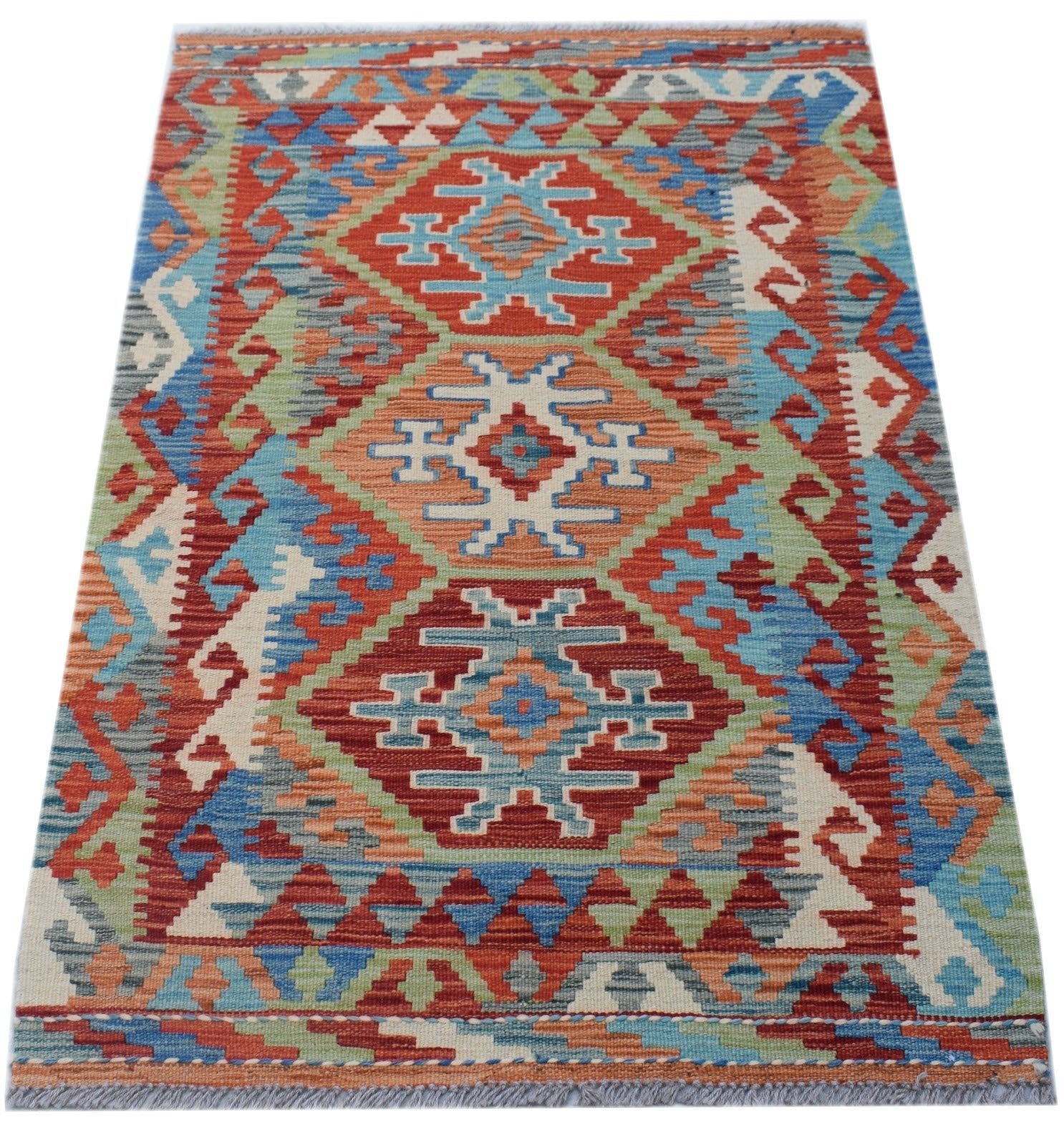 Handwoven Afghan Maimana kilim rug featuring a geometric diamond pattern in vibrant wool colors.