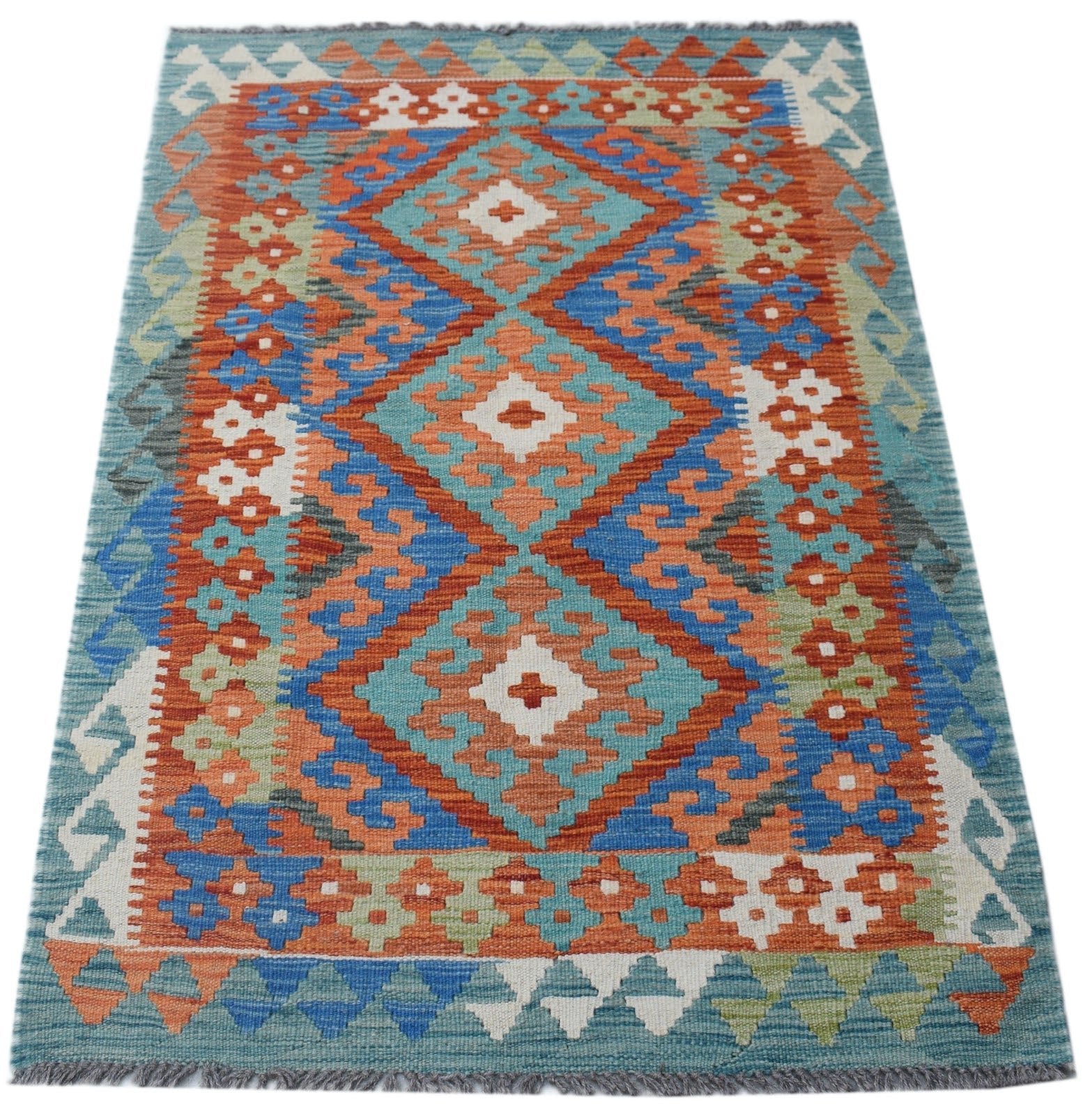 Handwoven Afghan Maimana kilim rug featuring a geometric diamond pattern in blue, orange, and white.