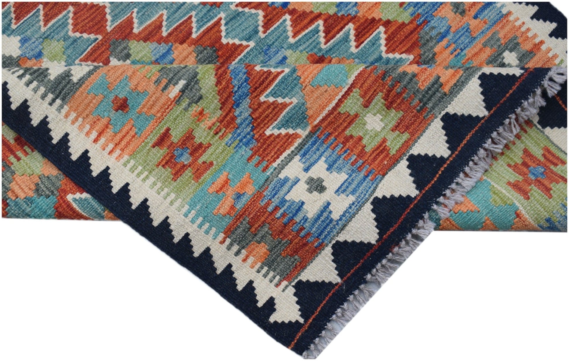 A handmade Afghan Maimana kilim rug featuring a vibrant geometric pattern in wool.