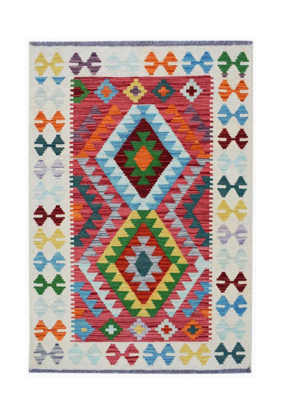 Handwoven Afghan Maimana kilim rug featuring a vibrant geometric pattern in wool.