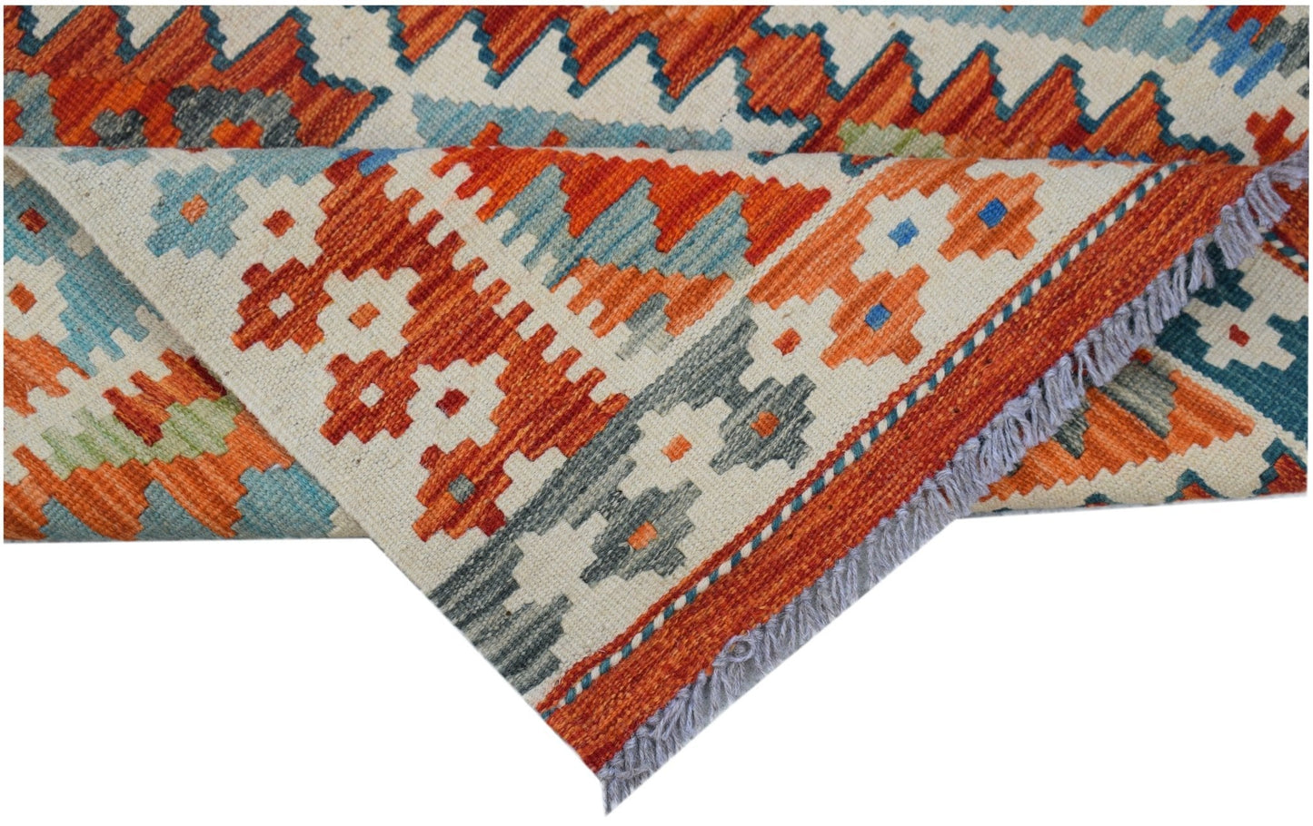 Handwoven Afghan Maimana kilim rug featuring a geometric pattern in orange, blue, and grey wool.