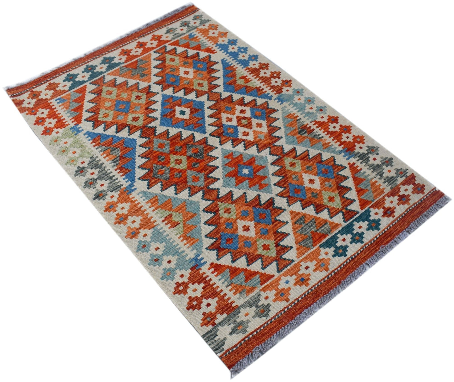 Handwoven Afghan Maimana kilim rug featuring a geometric diamond pattern in orange and blue tones.