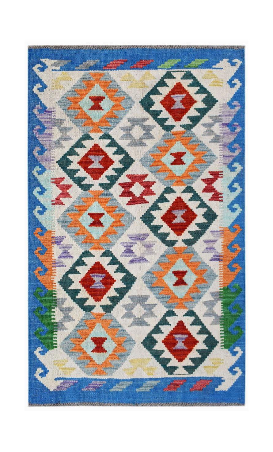 Handwoven Afghan Maimana kilim rug featuring a colorful geometric diamond pattern on a white field.