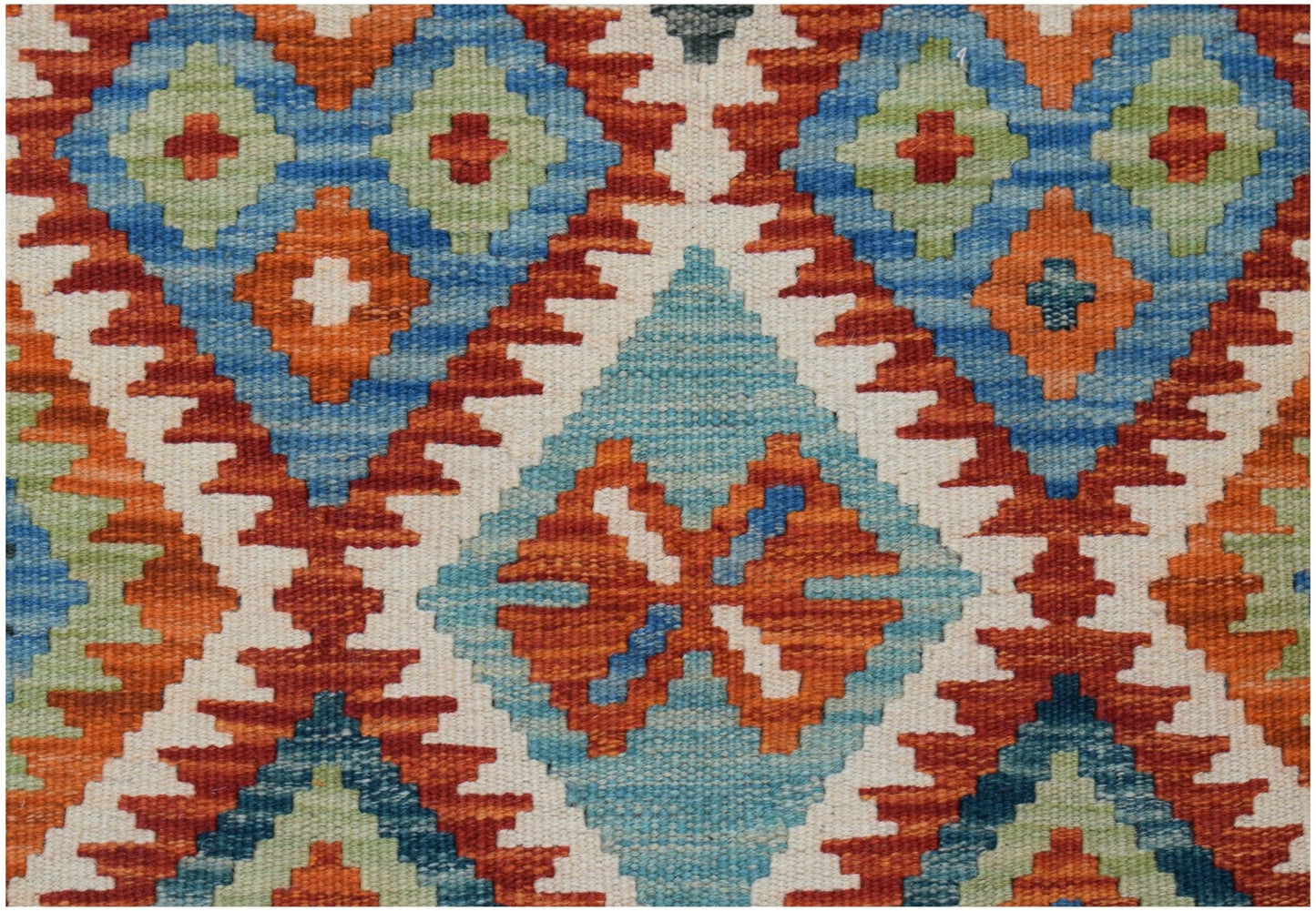 Handwoven Afghan Maimana kilim featuring a vibrant geometric pattern in blue, orange, and green.
