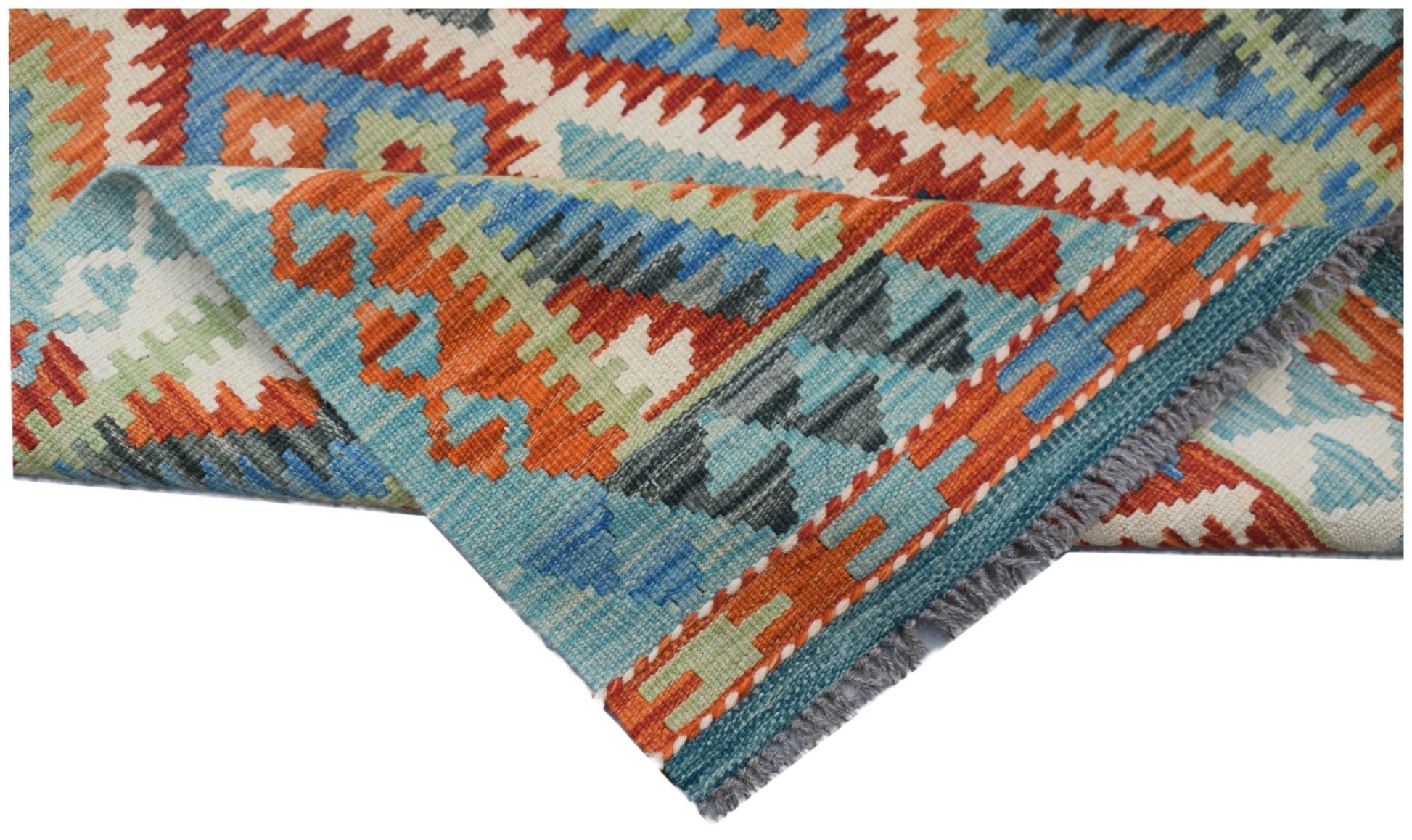 A handmade Afghan Maimana kilim rug featuring a geometric pattern in blue, orange, and green.