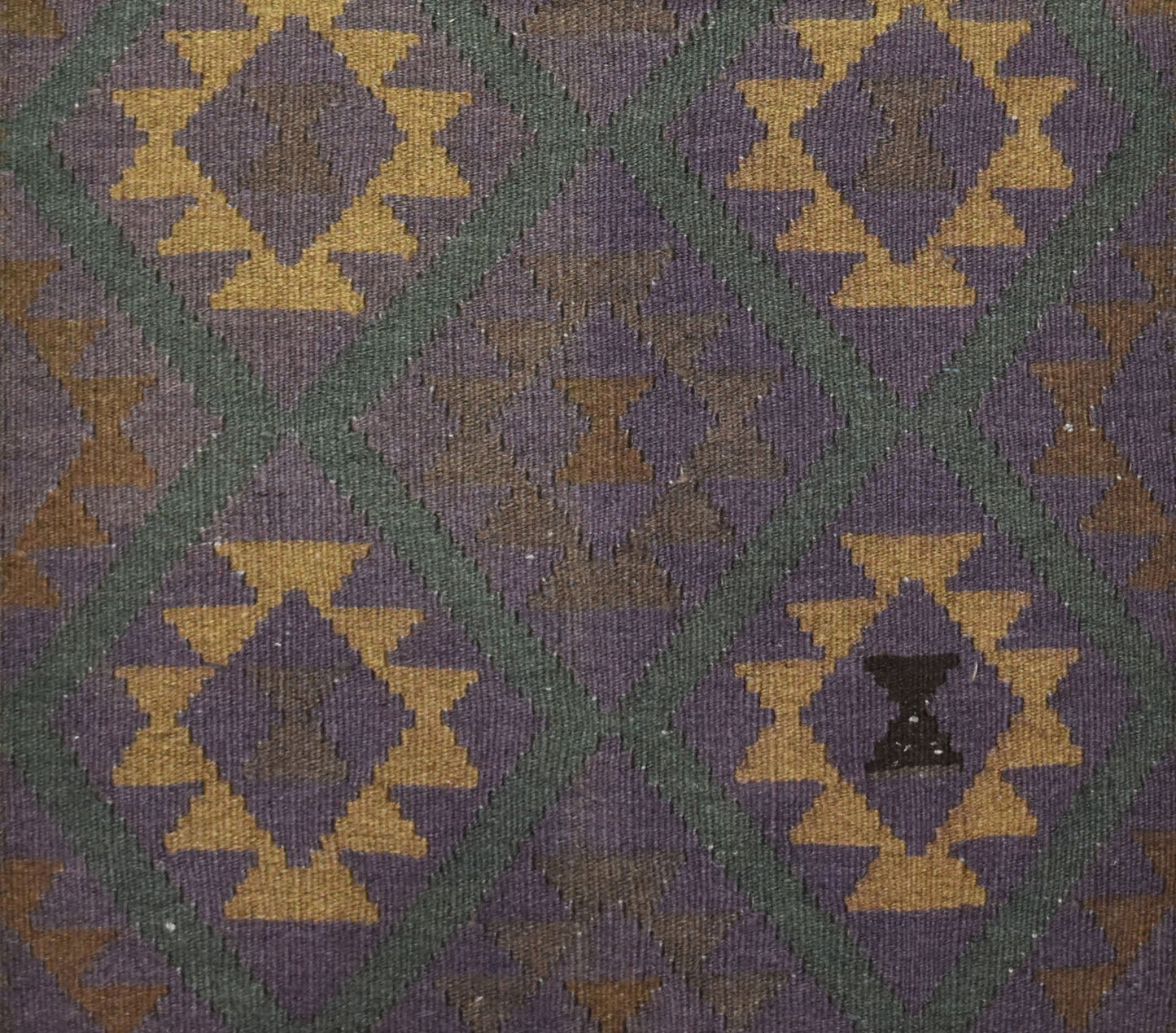 Handwoven Afghan Maimana kilim rug featuring a geometric diamond pattern in purple and gold.