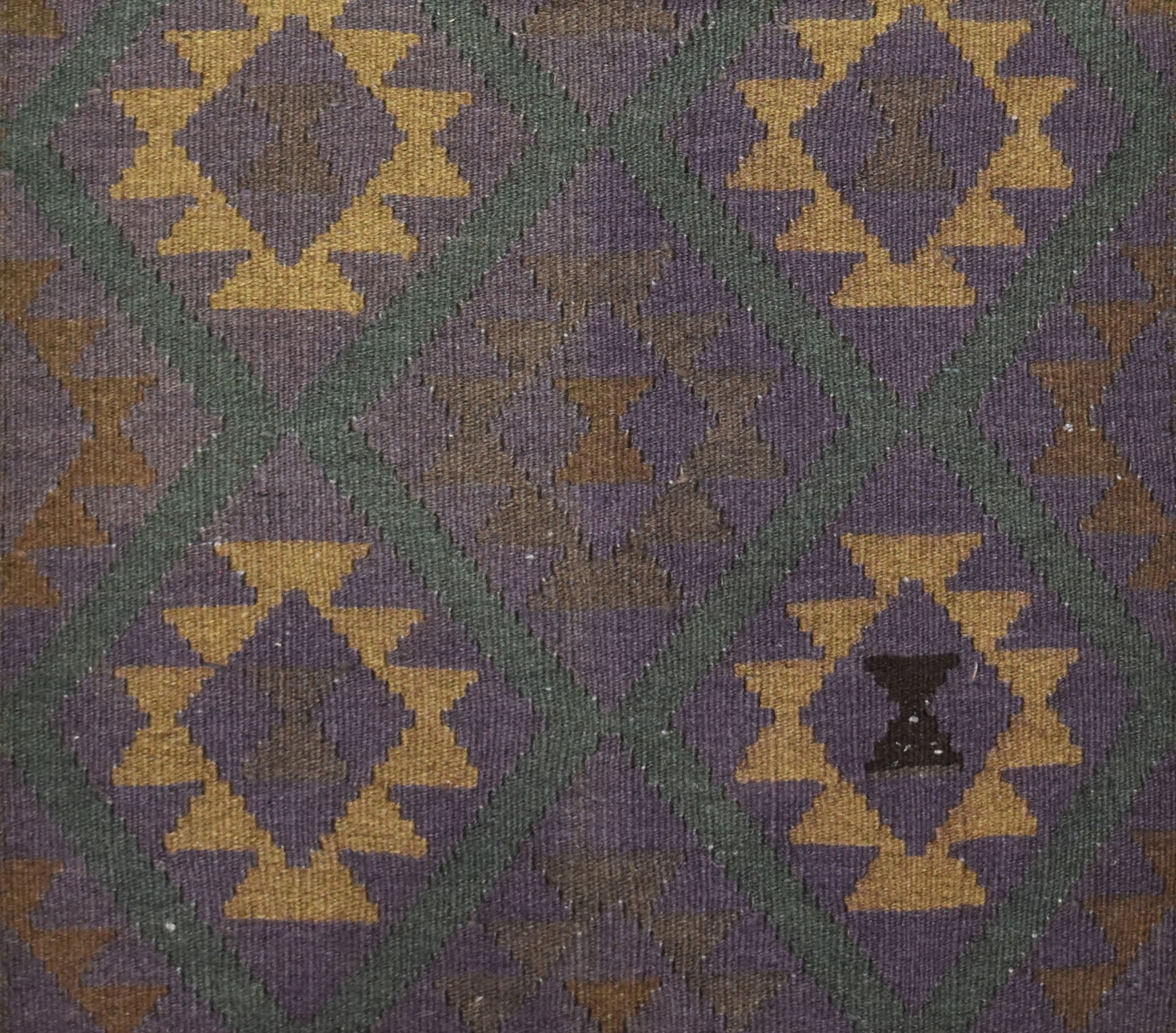 Handwoven Afghan Maimana kilim rug featuring a geometric diamond pattern in purple and gold.