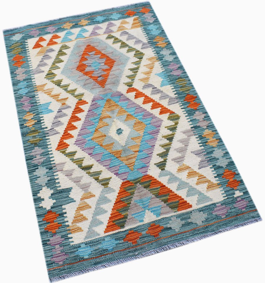 Handwoven Afghan Maimana kilim rug featuring a geometric diamond pattern in blue, orange, and tan.