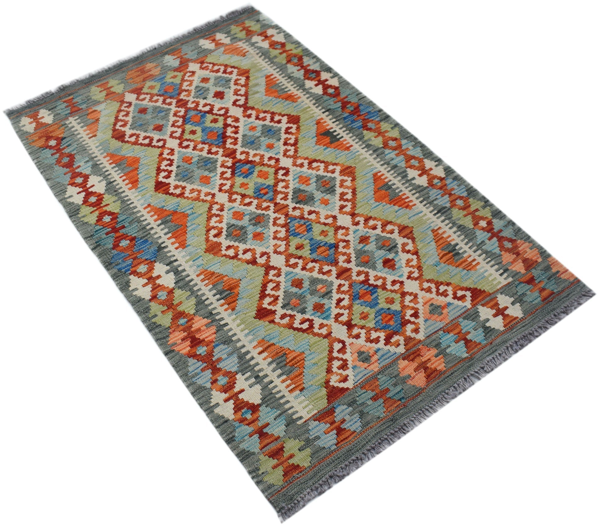 Handwoven Afghan Maimana kilim rug featuring a geometric diamond pattern in vibrant wool colors.