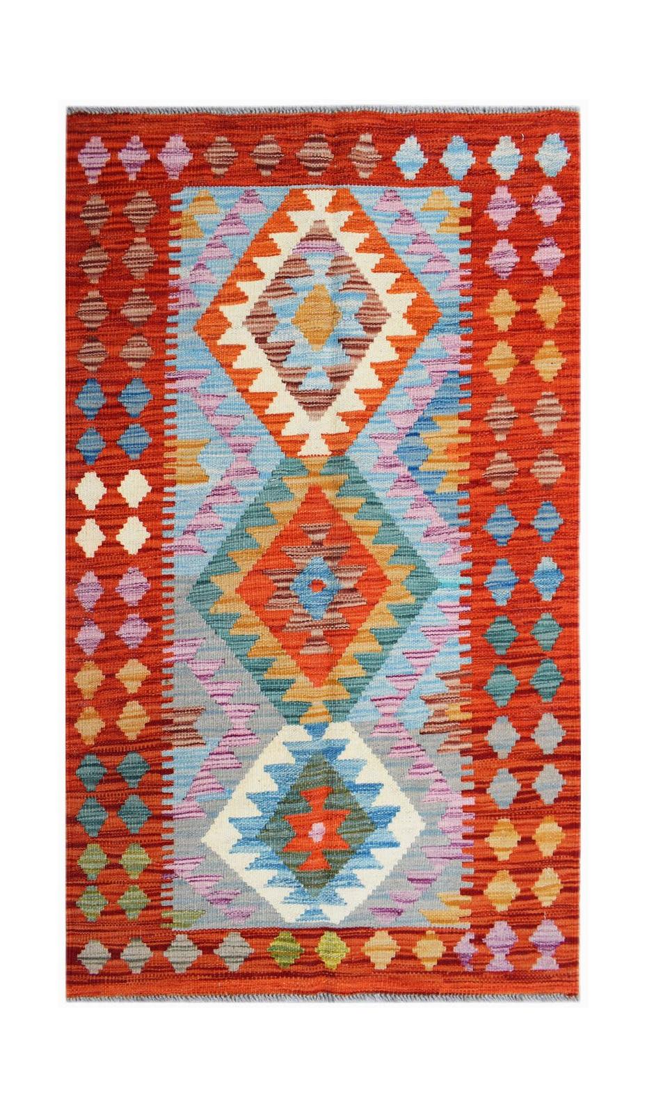 Handwoven Afghan Maimana kilim rug featuring a geometric diamond pattern in vibrant colors.