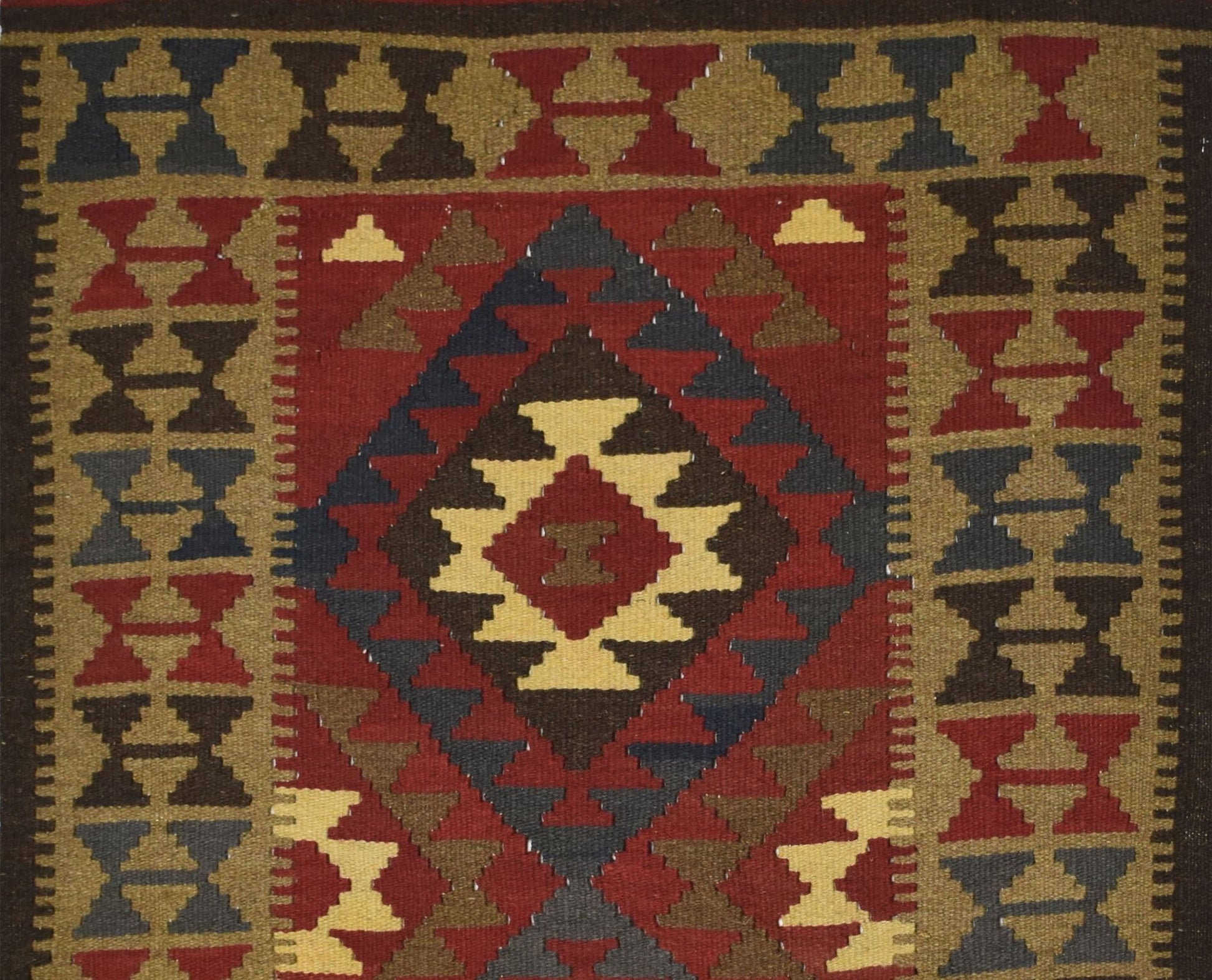 Handmade Afghan Maimana kilim rug featuring a geometric diamond pattern in red, brown, and tan.