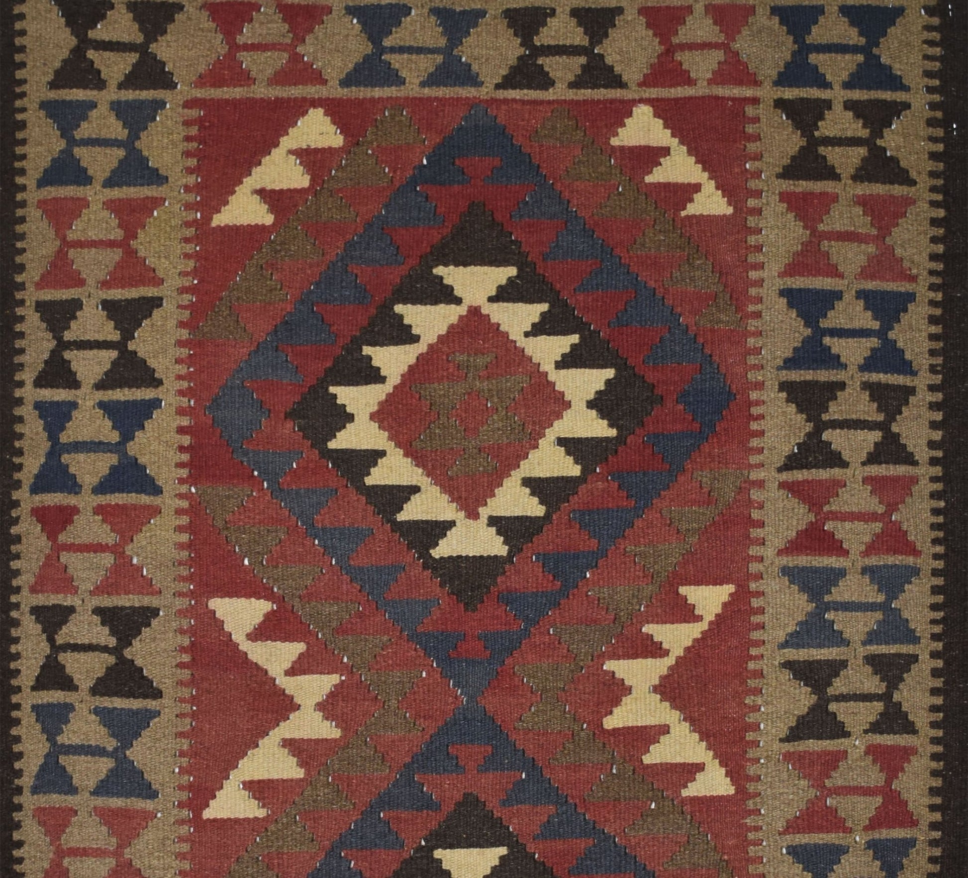 Handmade Afghan Maimana kilim rug featuring a geometric diamond pattern in red, blue, and tan.