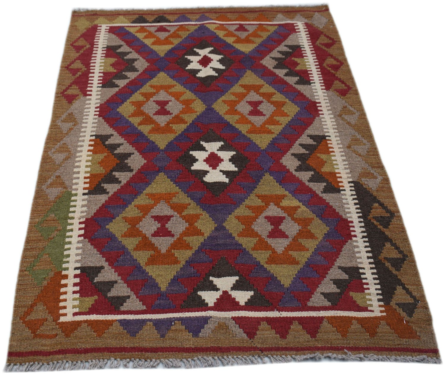 Handwoven Afghan Maimana kilim rug featuring a geometric diamond pattern in earthy tones.