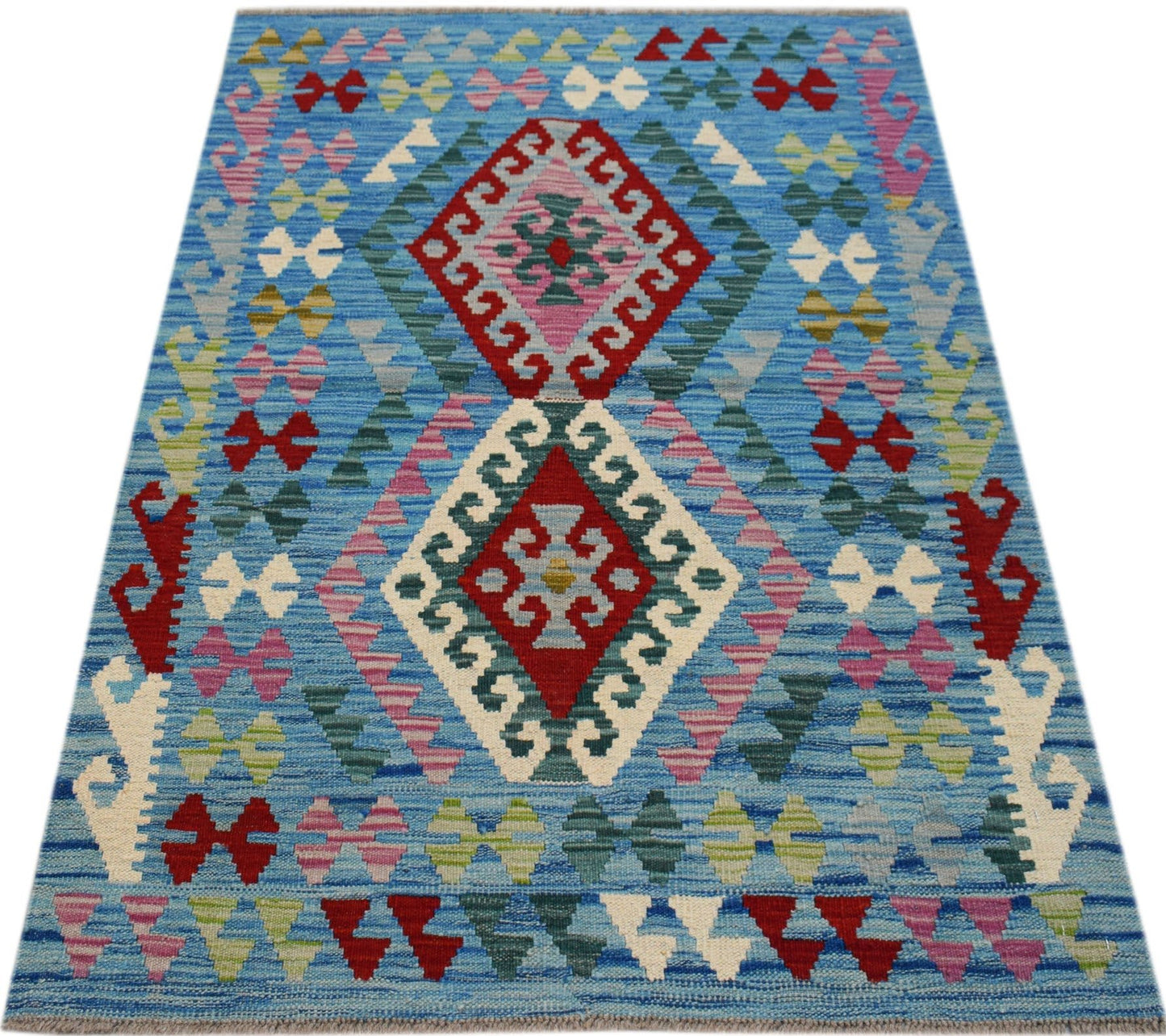Handwoven Afghan Maimana kilim rug featuring a blue background with geometric diamond patterns.