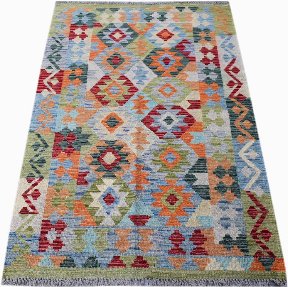 Handwoven Afghan Maimana Kilim rug featuring a colorful geometric pattern in wool.