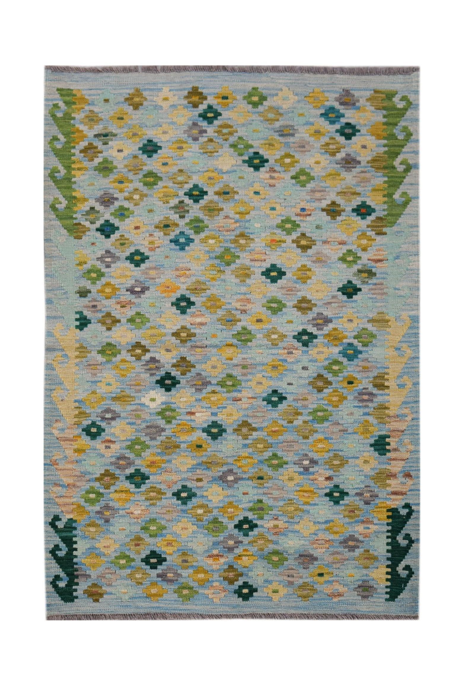 Handwoven Afghan Maimana kilim rug featuring a light blue field with colorful geometric patterns.