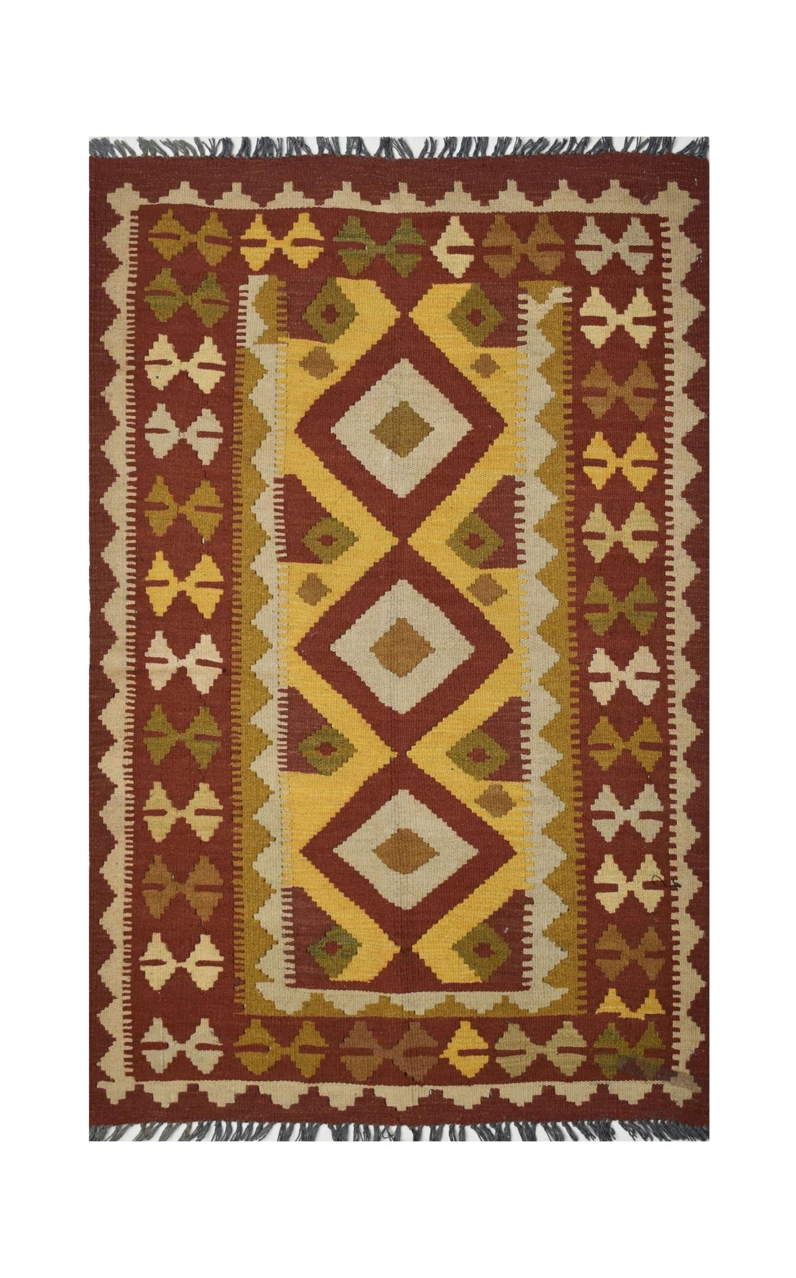 Handmade Afghan Maimana kilim rug featuring a geometric diamond pattern in earthy tones.