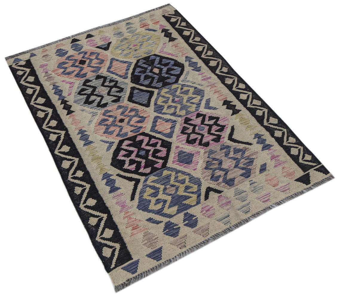 Afghan Maimana Kilim with geometric patterns in blue, pink, and beige.